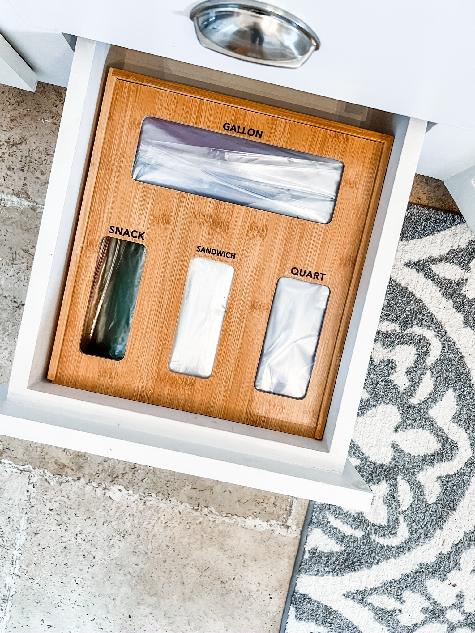 This bamboo organizer fits a standard kitchen drawer and hold all four bag sizes!

#LTKBacktoSchool #LTKhome #LTKkids