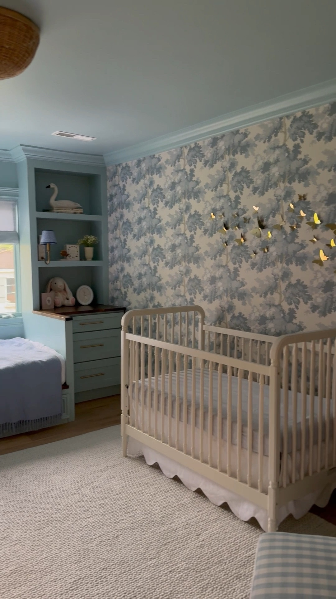 Cosie’s pretty blue nursery! Wallpaper is light blue colorway. The blue paint on the trim and ceiling is Blue Porcelain by BM. Bed is a twin XL

#LTKBaby #LTKHome #LTKWatchNow