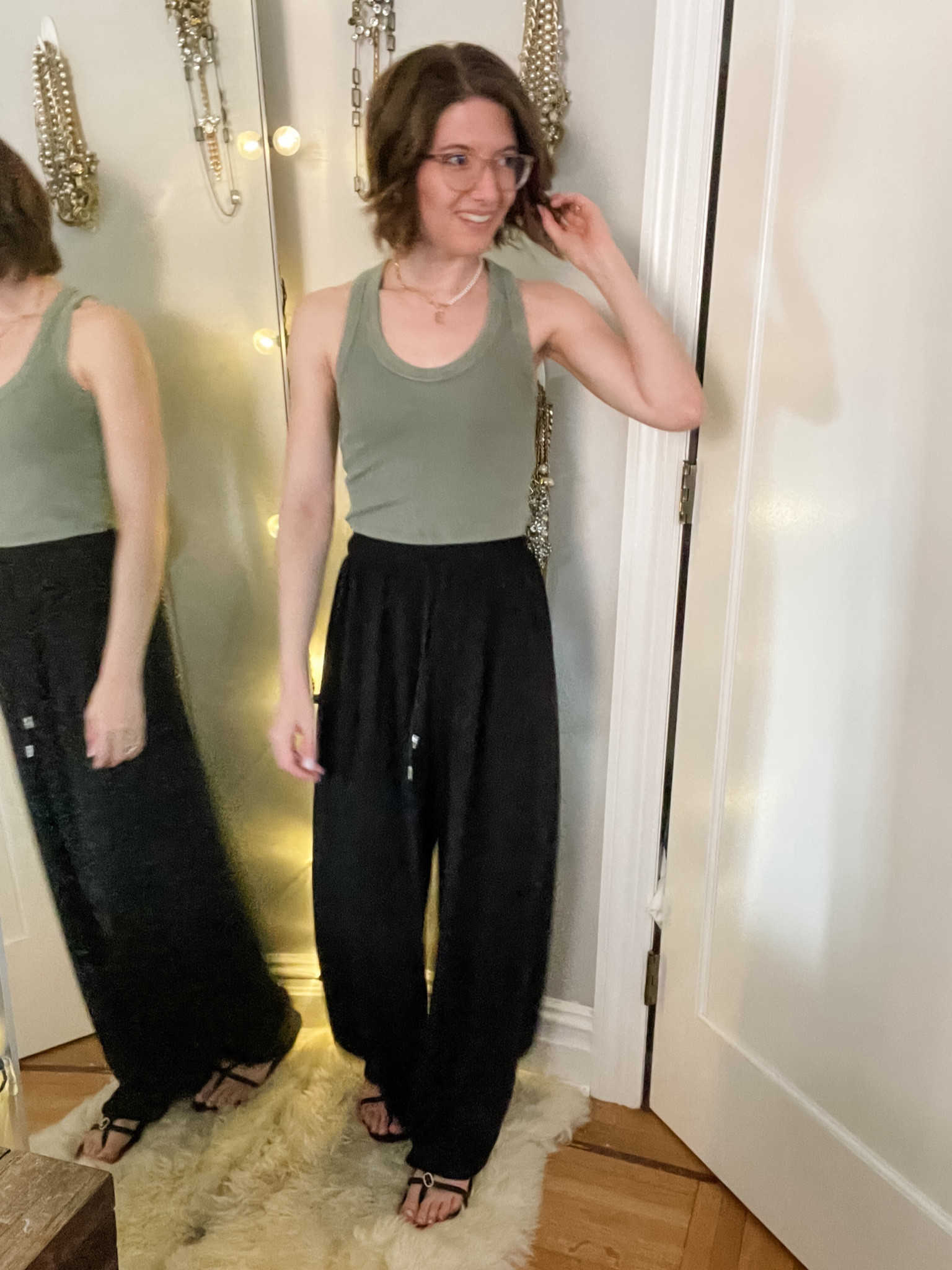 Cropped tank: TTS
Pleated pull on pants: one size (fits like a small)
Sandals: TTS

Travel outfit | summer to fall transition | wide leg pants | pull on pants 

#LTKSeasonal #LTKTravel #LTKStyleTip