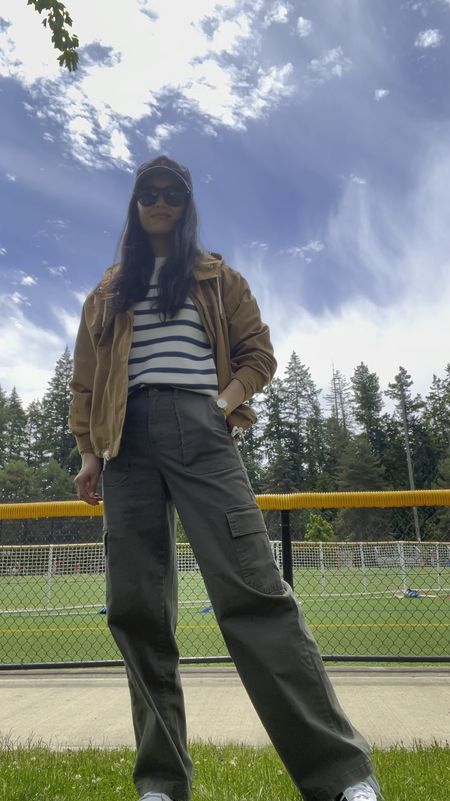 Water resistant jacket, runs big, I sized down to XS
Cargo pants, mine are old but I linked similar
Striped sweater is old

