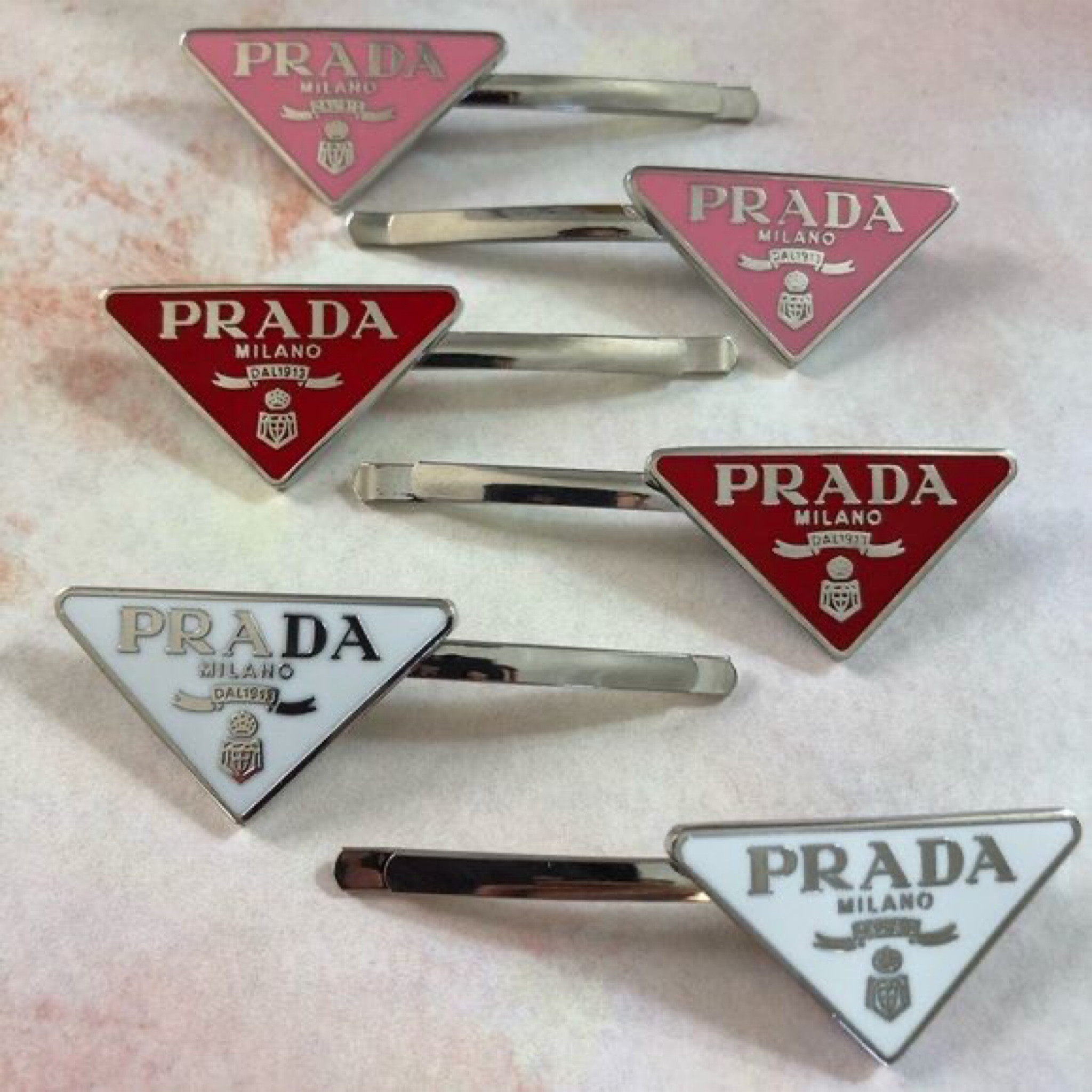 Prada Hair Clips from Dhgate 

#LTKstyletip #LTKsalealert #LTKbeauty