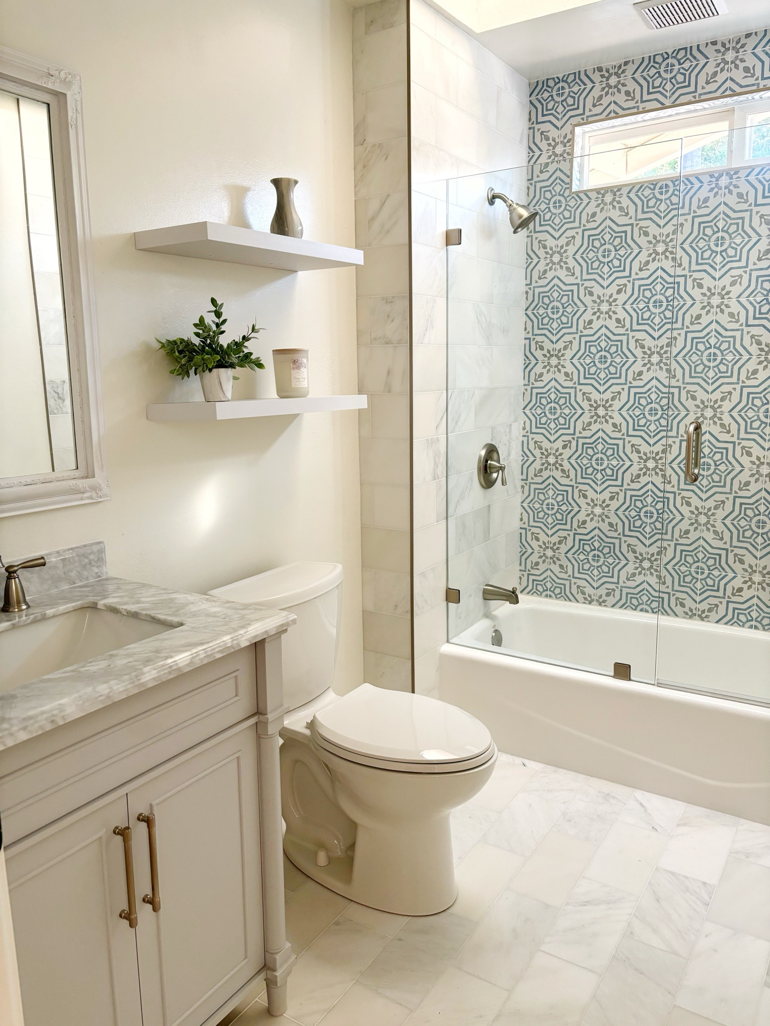 Bathroom update for a client with new tile, vanity and shelves.  

#LTKhome