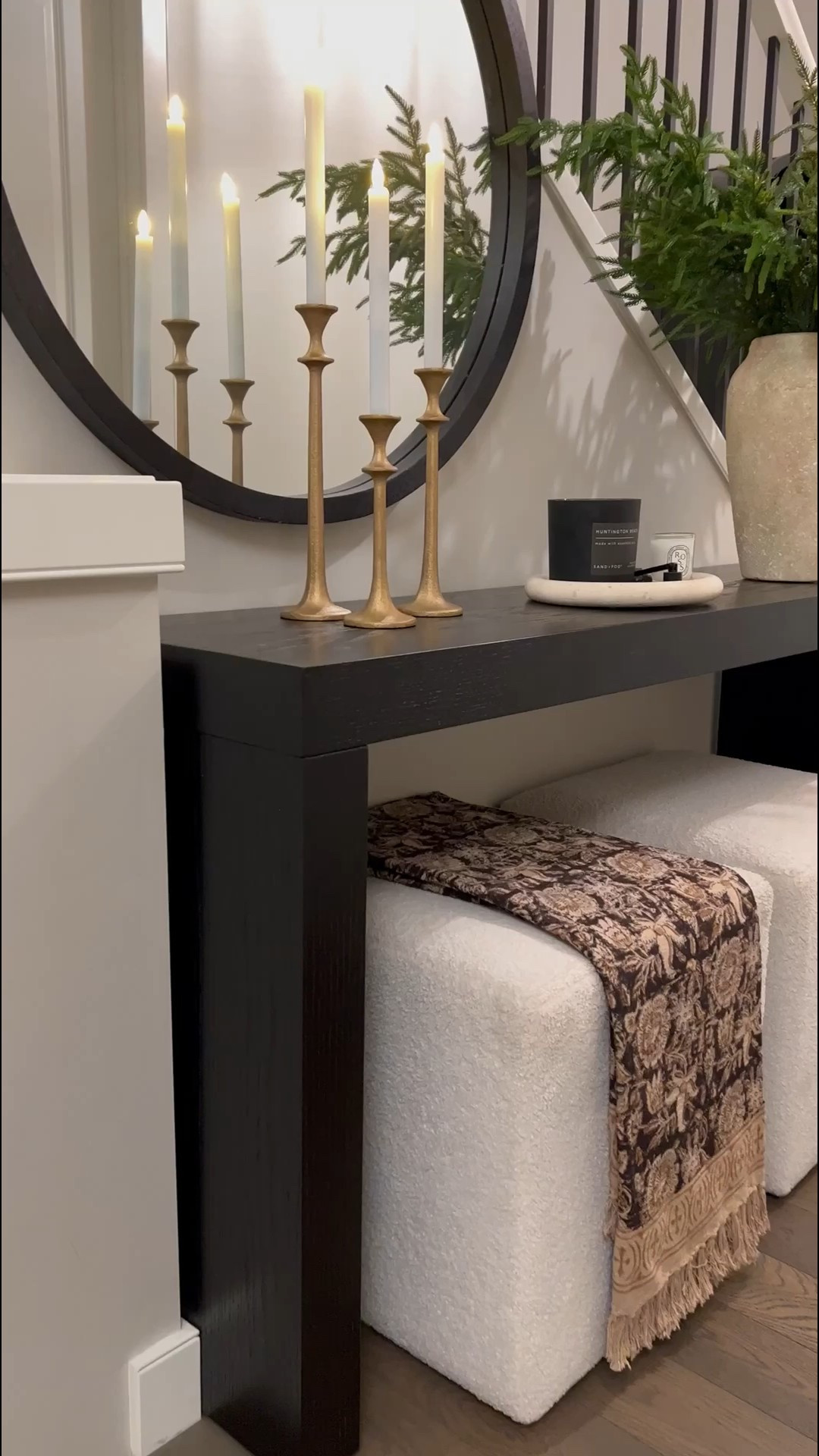 Christmas may be over, but timeless pieces never go out of style! 😍 I styled this cream ceramic vase with fresh Norfolk pine stems for a cozy, all-season look. These always sell out fast—so don’t wait to grab yours! 🌿

Black console table
Round black mirror
Set of 3 candle holders 

#LTKHoliday #LTKVideo

#LTKHome