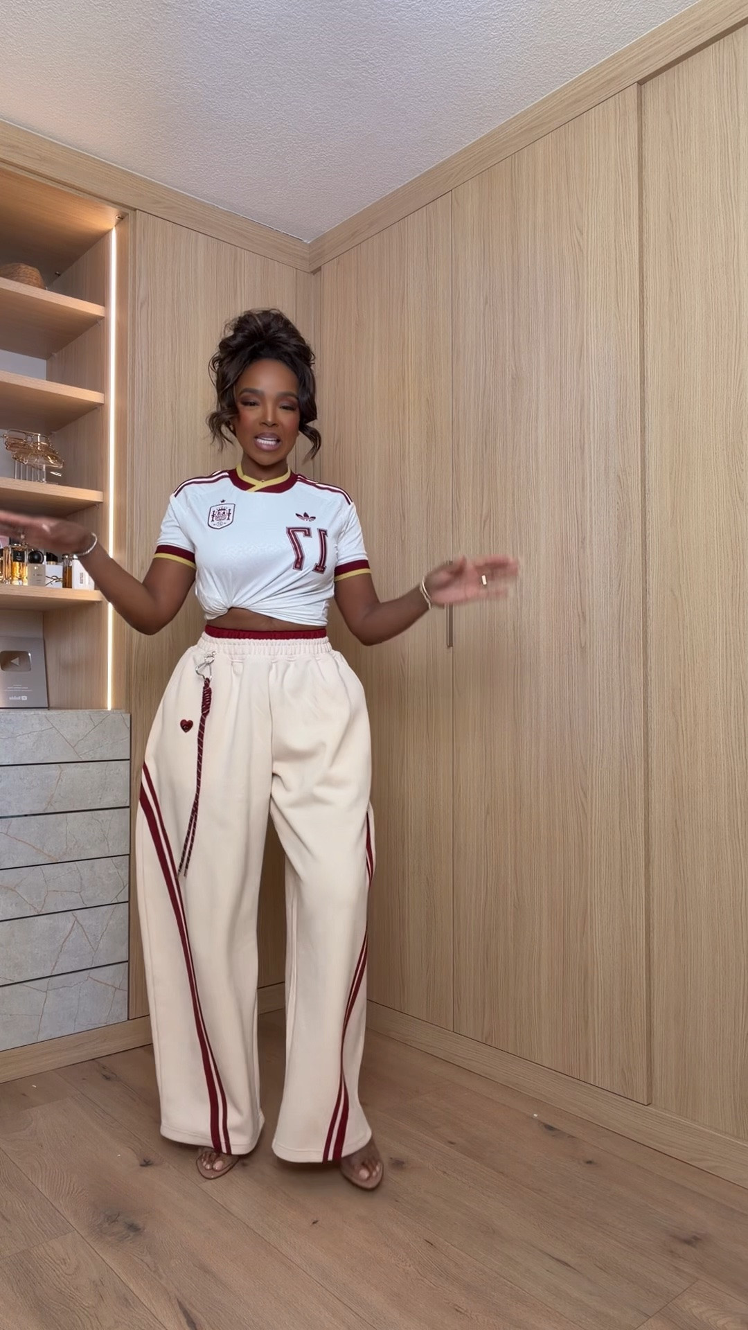 Hi Babes! 🤍

This sporty-chic set is giving designer-inspired energy without the designer price tag! I love how the cropped jersey pairs with the wide-leg track pants for an effortless look that feels trendy, comfy, and put together all at once.

✨ Fit Details:
• Wearing a Size Small
• Top is true to size
• Pants have a relaxed wide-leg fit with an adjustable waistband
• Super comfortable and lightweight

🤍 Where to Wear:
• Running errands
• Casual lunch dates
• Airport travel
• Weekend shopping
• Coffee runs
• Everyday casual looks

✨ Style Tip:
Pair it with gold jewelry, neutral heels or sneakers, and a sleek bun or messy updo for an elevated sporty vibe.

Everything is linked below!

xx, Kira | IG: KirasFashionFinds

Measurements:
5'4" | Size Small | 140 lbs