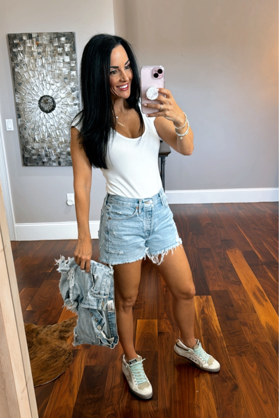 Target white bodysuit 
Agolde cut off denim shorts 
Golden goose 

#LTKstyletip #LTKtravel #LTKfindsunder50