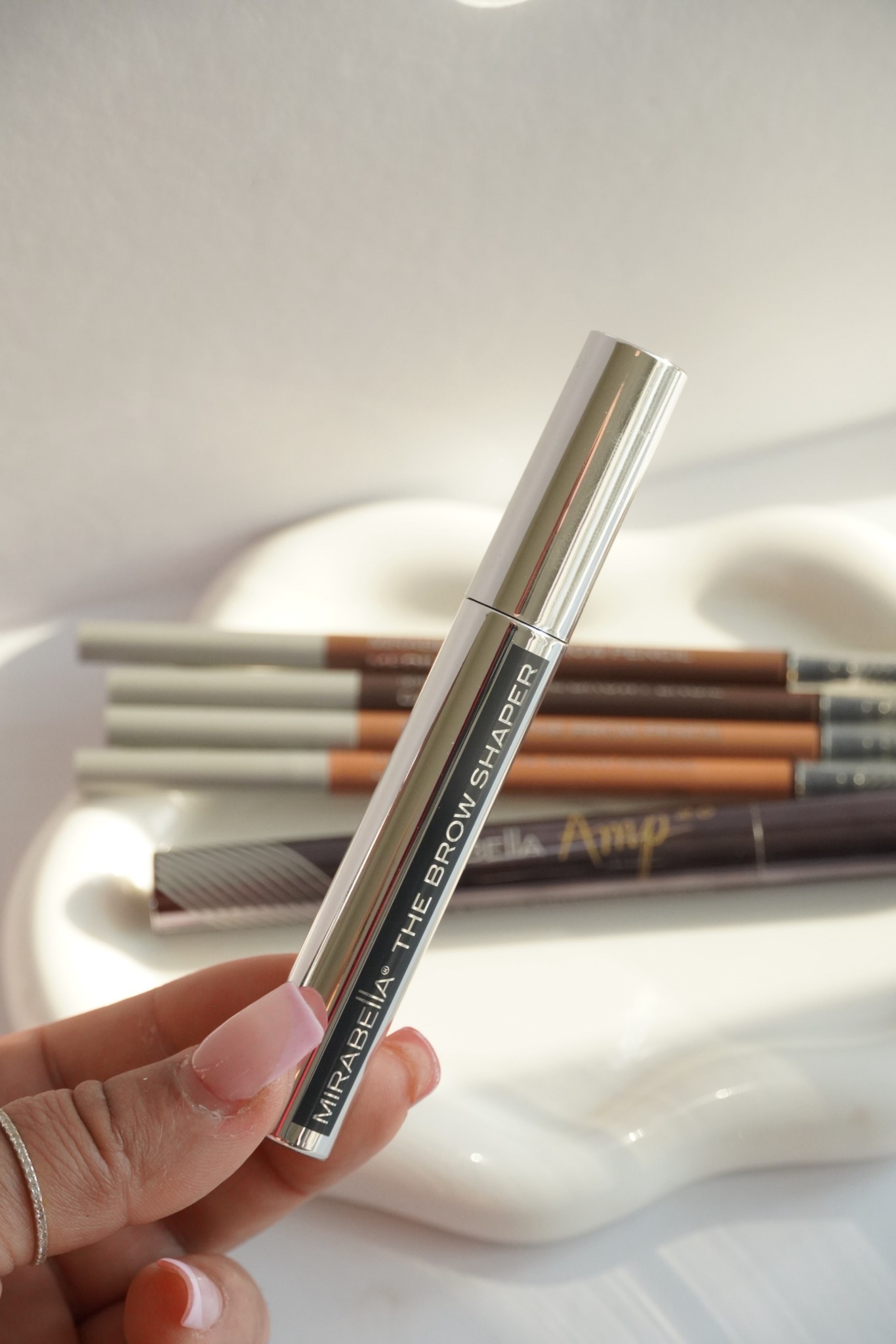 @Mirabella brow shaper to define brow hairs 

#LTKBeauty