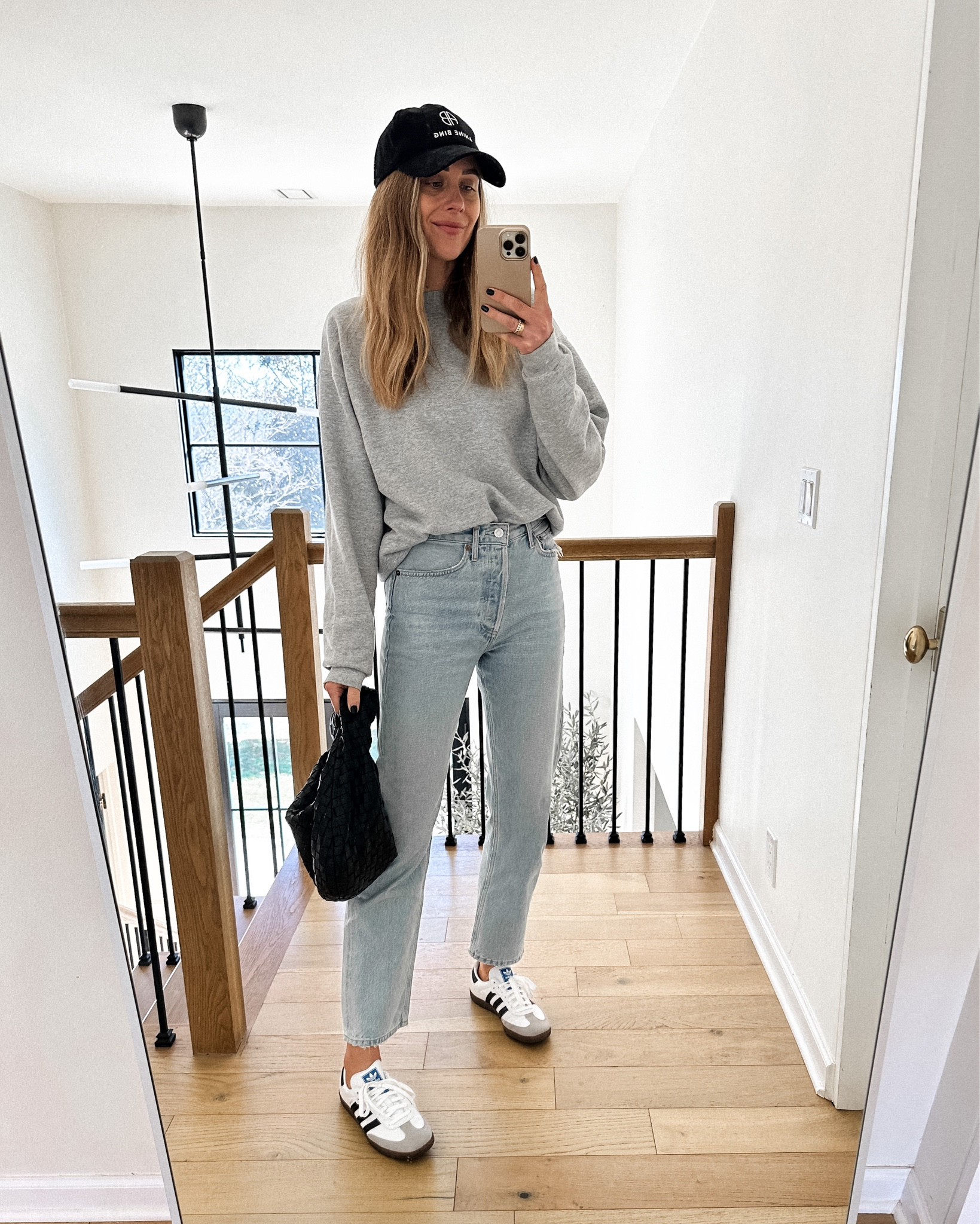 Fashion Jackson wearing Amazon sweatshirt (medium - sized up for oversized fit) AGOLDE jeans (tts) adidas samba white sneakers, black baseball hat, bottega veneta Jodie teen handbag #fashionjackson #soringoutfit 

#LTKshoecrush #LTKstyletip #LTKunder100