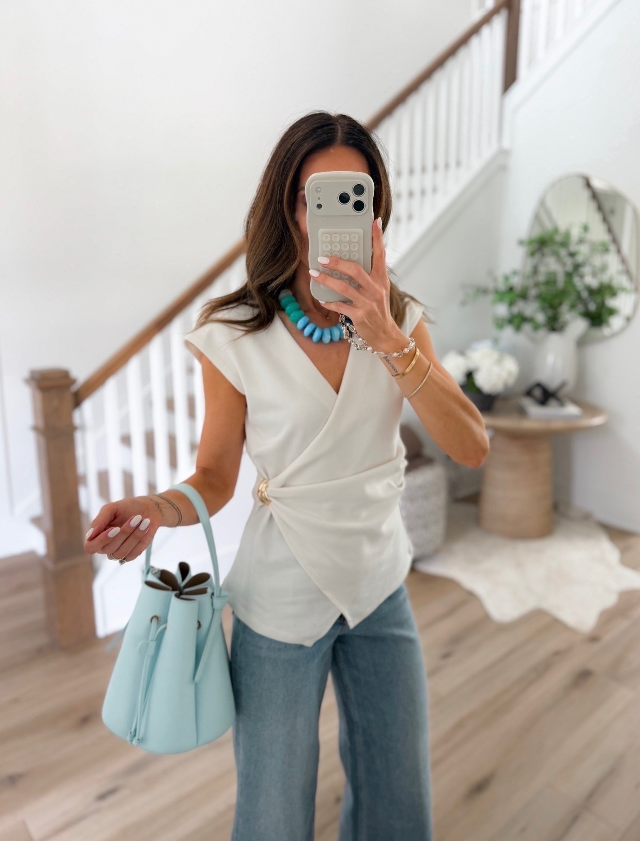 Anthropologie wrap top on sale for $61. Block heels fit tts. casual chic, office outfit, business casual, sleevless blazer, cropped jeans, annabrstyle

#LTKSaleAlert