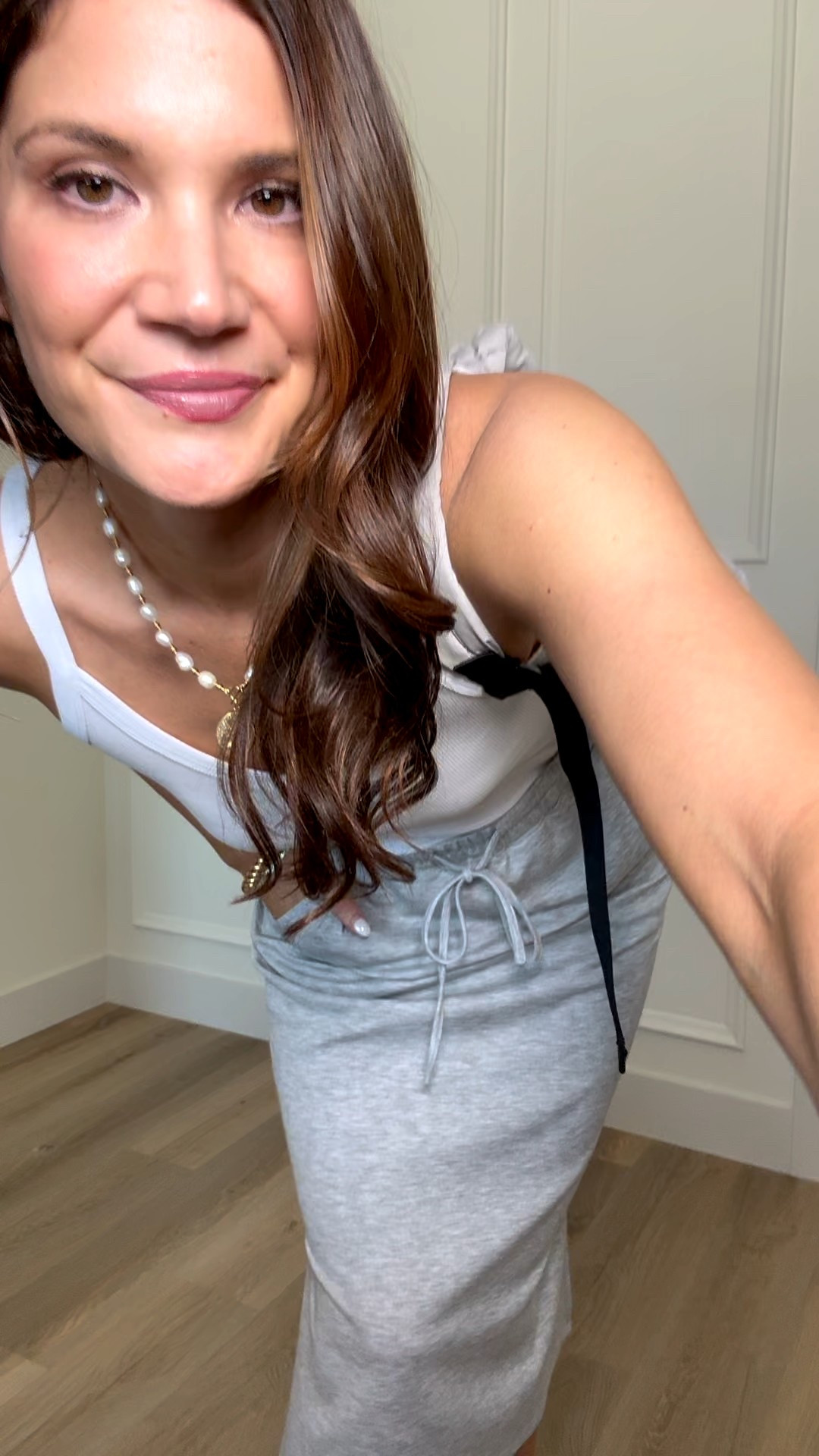 This feels like such a good vacation outfit. You can style it so many ways, and the skirt is incredibly soft and comfortable. It is high rise, stretchy, has pockets, and hits past the knee. Wearing a size large. The tank top is just as good, I love the neckline and the torso length.
 vacation outfit, travel outfit, high rise skirt, stretchy skirt with pockets, midi skirt outfit, comfortable travel clothes, elevated casual outfit, tank top with good length, flattering neckline top, spring vacation style

#LTKSeasonal #LTKTall #LTKTravel