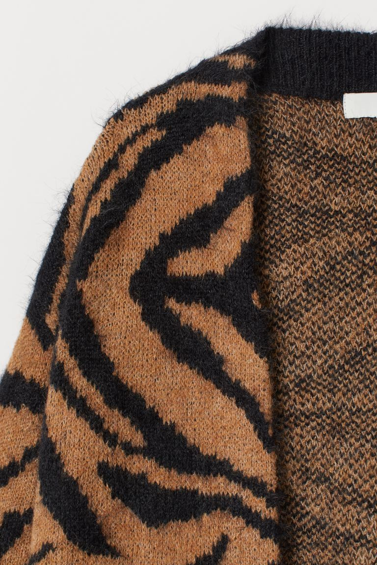 Long cardigan in soft jacquard-knit fabric with wool content. Dropped shoulders, long sleeves, an... | H&M (US + CA)