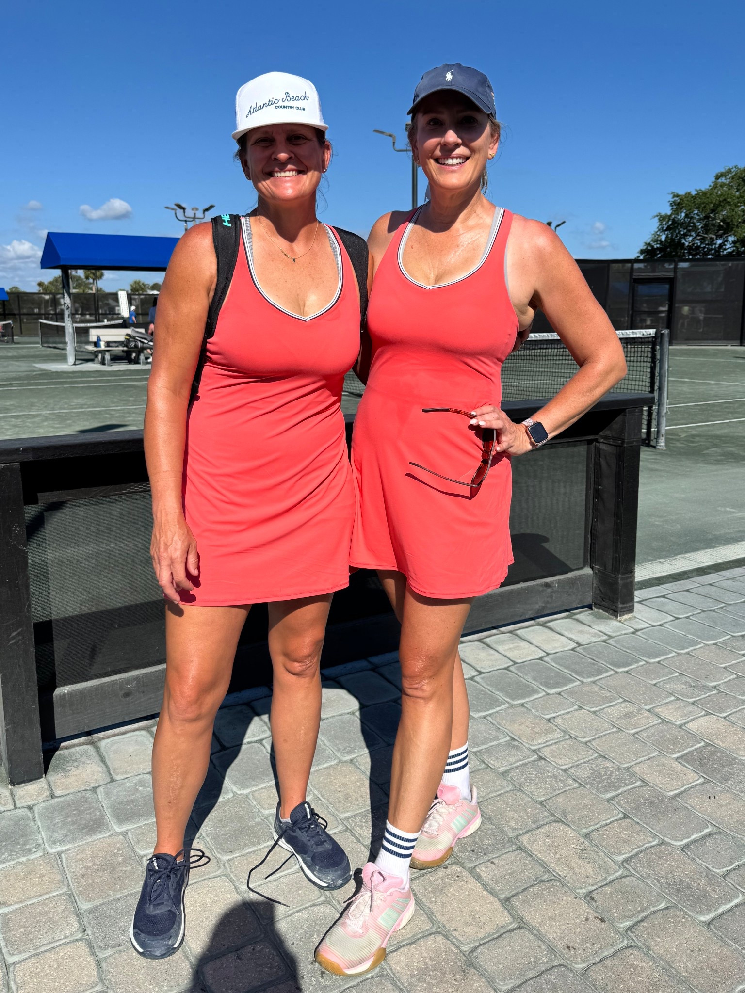 LOVE these tennis dresses! They have the pull down shorts (connected in the front, not the back) and are super soft and comfortable! They come in this beautiful coral, a light blue and black! Under $30 right now on sale!

We are both in a size Medium. I still needed a sports bra but if I was wearing just as a casual dress, I wouldn’t need one  

#tennisdress #under30 #ltksale #targetsale #over40ltk 

#LTKSaleAlert #LTKFindsUnder50 #LTKOver40