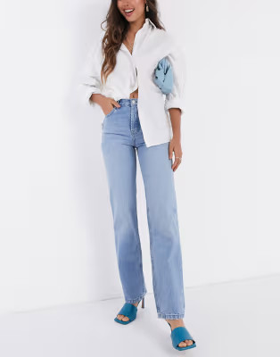 ASOS DESIGN mid rise '90's' straight leg jeans in midwash | ASOS (Global)