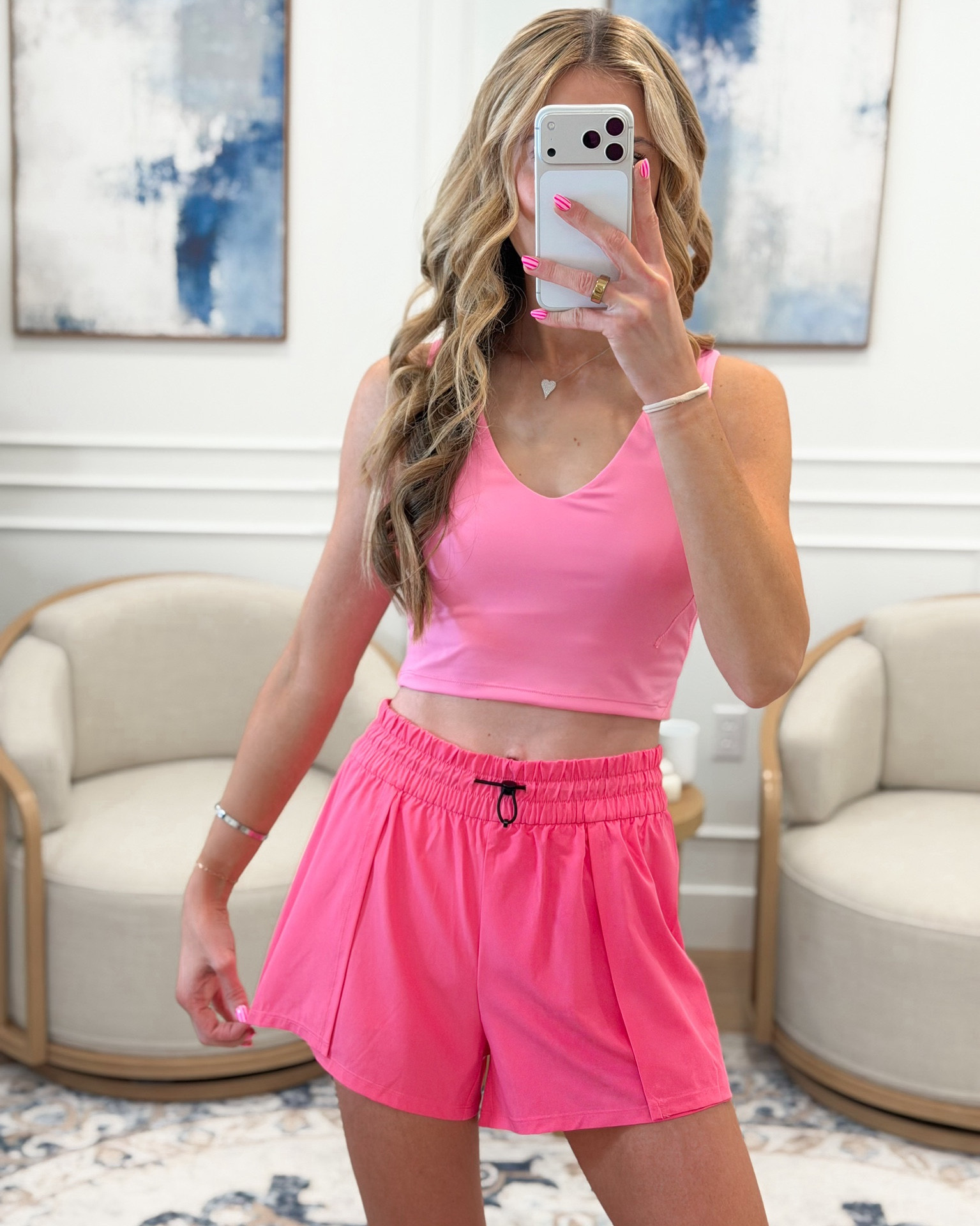 Hot pink activewear that actually makes you want to work out — this v-neck sports bra and smocked waist athletic shorts from Amazon are giving all the good energy 🩷✨ The buttery soft sports bra, the pleated smocked waist shorts with the drawstring detail — both separate pieces that coordinate so perfectly together. I am wearing a small, I am 5’8” for reference. 

#LTKfitnessgoals #LTKActive #LTKSeasonal