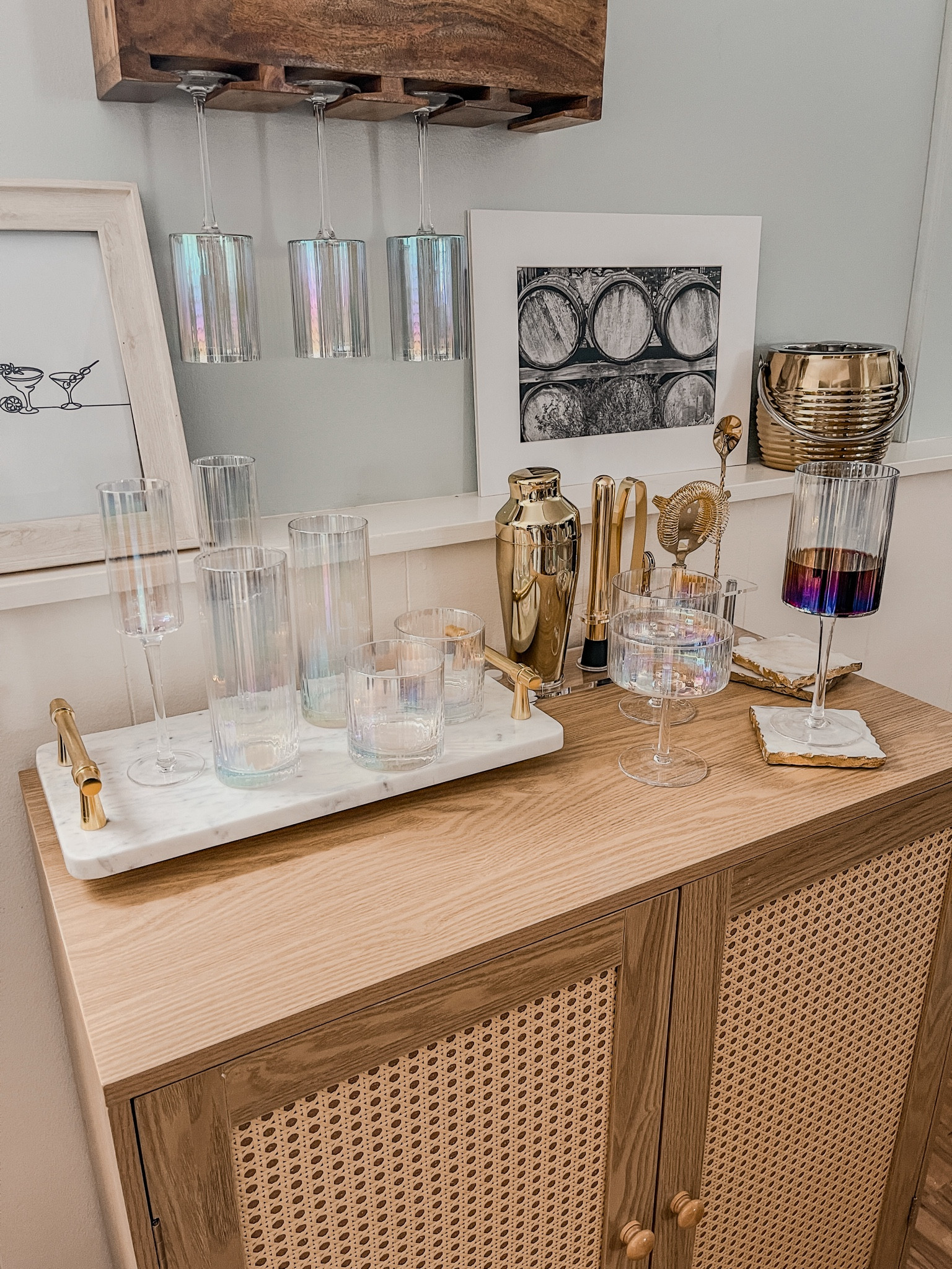 My @joyjolt glassware is so stunning on my new bar cart. These are from the Christian Siriano New York collection & they are so pretty!! I love the iridescent color and how they make everything more fun! They come in all different types of drinkware from wine glasses to coupes to champagne flutes to dof glasses to highball glasses! Truly something for every drink! #joyjolt #JoyJoltPartner #ad

#LTKparties #LTKhome #LTKfindsunder100