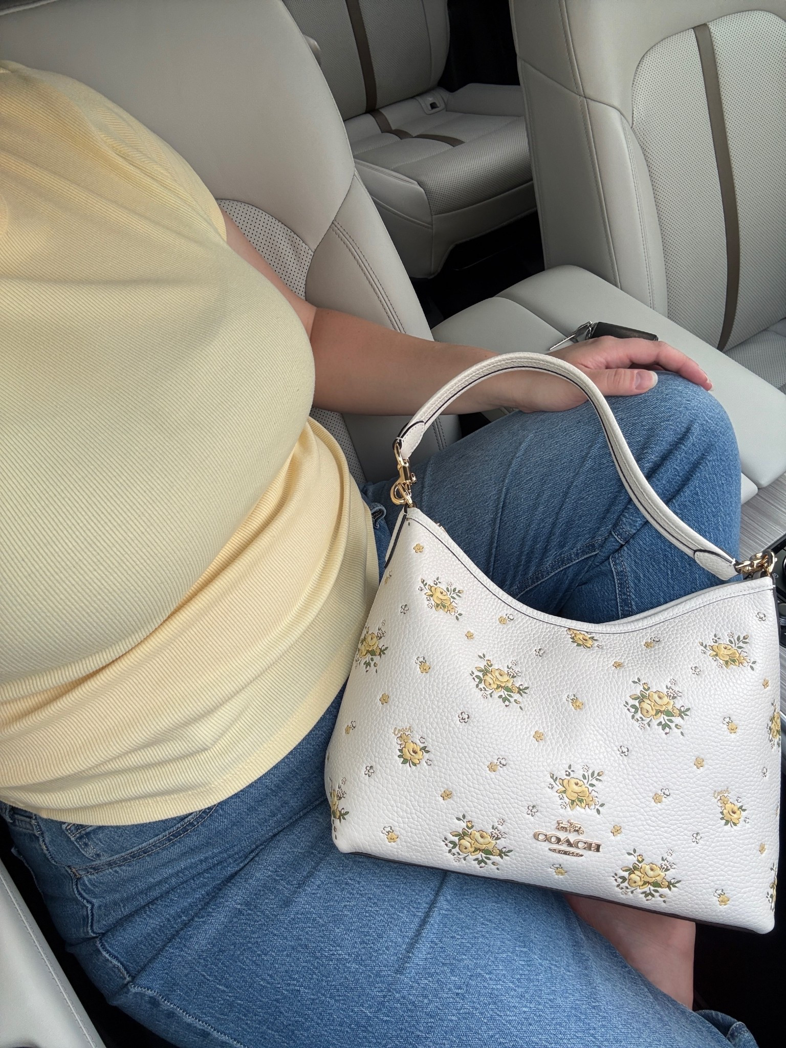 The perfect summer color combo of denim and butter yellow with the cutest floral coach purse! The purse is currently 70% off! 

#LTKMidsize #LTKItBag #LTKSummerEdit
