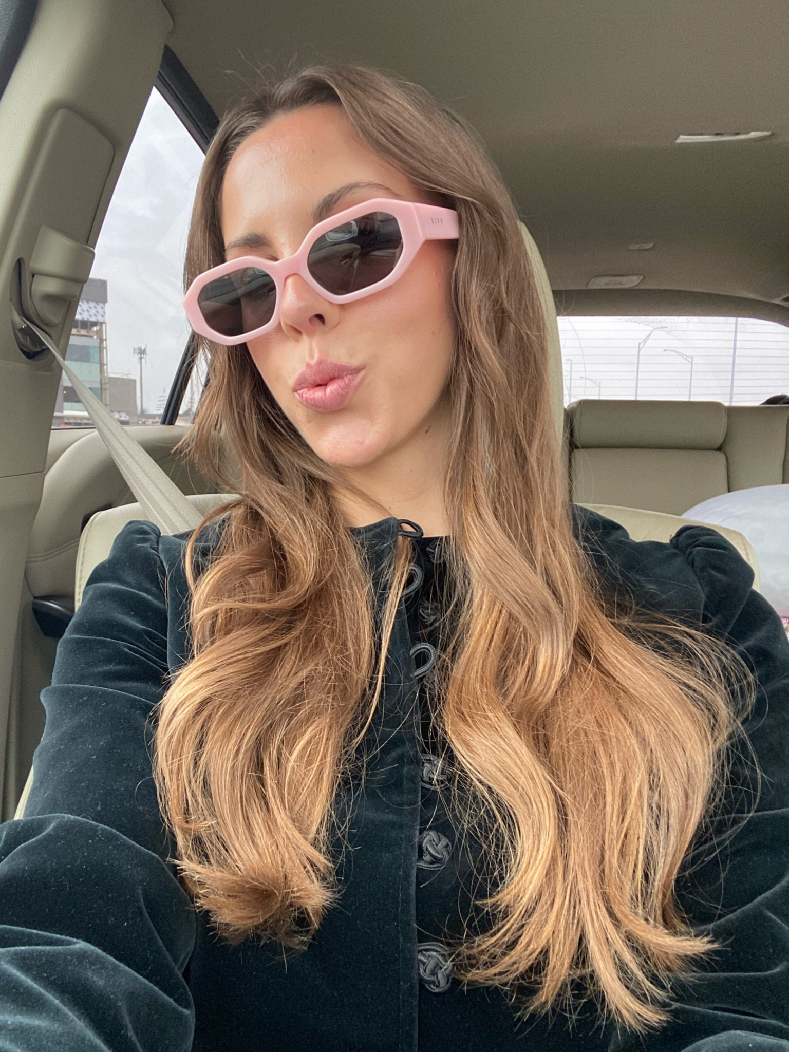 My new sunnies from Diff! Love the baby pink color and the shape. Fun way to add a pop of color to a monochrome black outfit. 

#LTKfindsunder100 #LTKGiftGuide #LTKsalealert