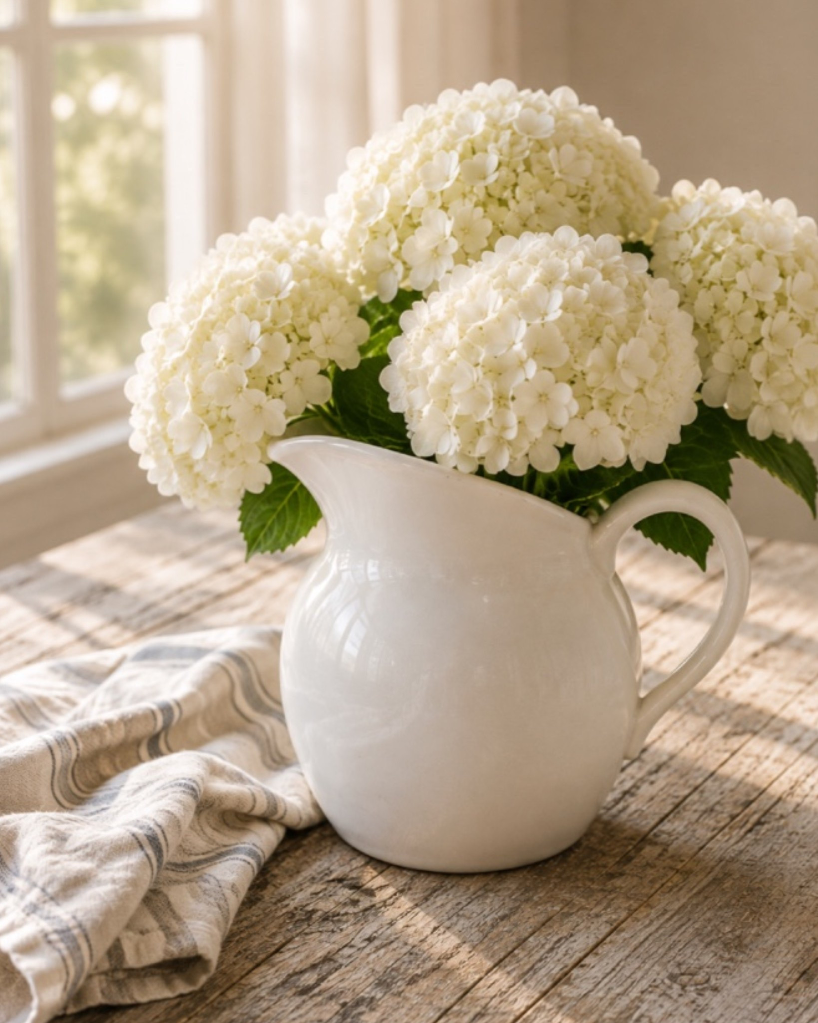 I’m starting a timeless gift closet, and I’d love for you to build one with me. Each week I’ll share one beautiful gift that’s thoughtful, useful, and always a joy to give. This classic pitcher is the first piece in the collection. 🤍

One of my favorite hostess gift ideas is a classic white pitcher filled with fresh hydrangeas. It’s beautiful the moment you walk in the door, and it’s something they’ll enjoy long after the flowers are gone. 🤍
Vase holds 14oz