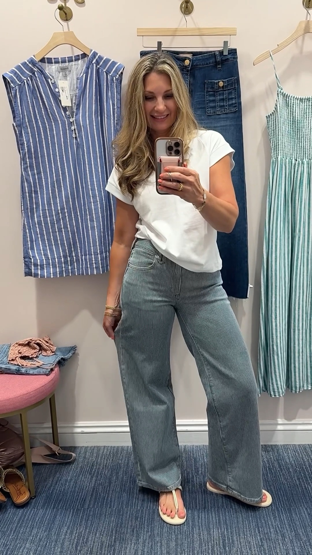 A muscle tee that is a closet staple - v-neck, relaxed fit, and cap sleeves. Looks super cute with these railroad striped jeans. Love the wide leg fit 🤍 Jeans on sale!

#LTKootd #LTKmomlife #LTKOver40