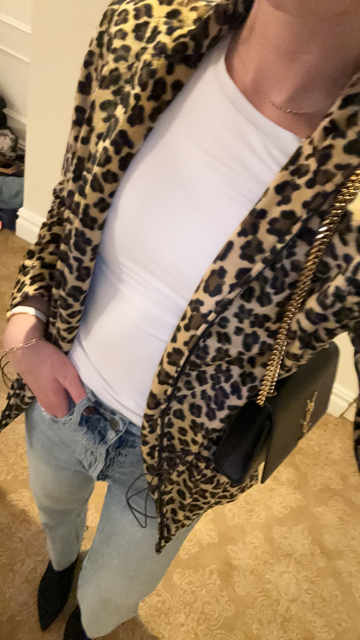 Leopard print jacket with white long sleeve tea, shirt and light wash denim jeans. Boots. New York outfit. New Year’s Eve outfit. Outfit. Winter outfit. Cold-weather outfit. Boots outfit. Affordable fashion. Vacation outfits. Cherry coded. Moto Boho. Minimalist outfits. Capsule wardrobe. Street style. Retro looks. Effortless elegance. Chunky boots. Statement coats. Cozy sweaters. Holiday party outfit. Monochromatic looks. Natural glam. 