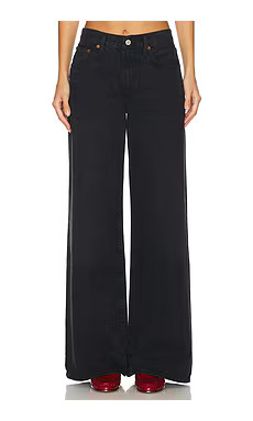 AGOLDE Clara Low Rise Baggy Flare in Mascara from Revolve.com | Revolve Clothing (Global)