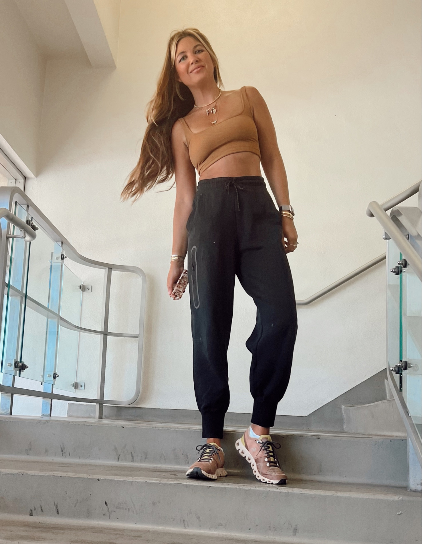 Tennis shoes, sports bra, black joggers, 

Casual pieces for a 3-mile walk ⚡️💃🏼
Too: medium 
Pants: medium 
Shoes: 7 1/2 …like clouds ☁️ 
Also wearing the blur balm in 5, concealer in peach, lip pencil in fill me in and lip oil! 

#LTKbeauty #LTKunder50 #LTKfit