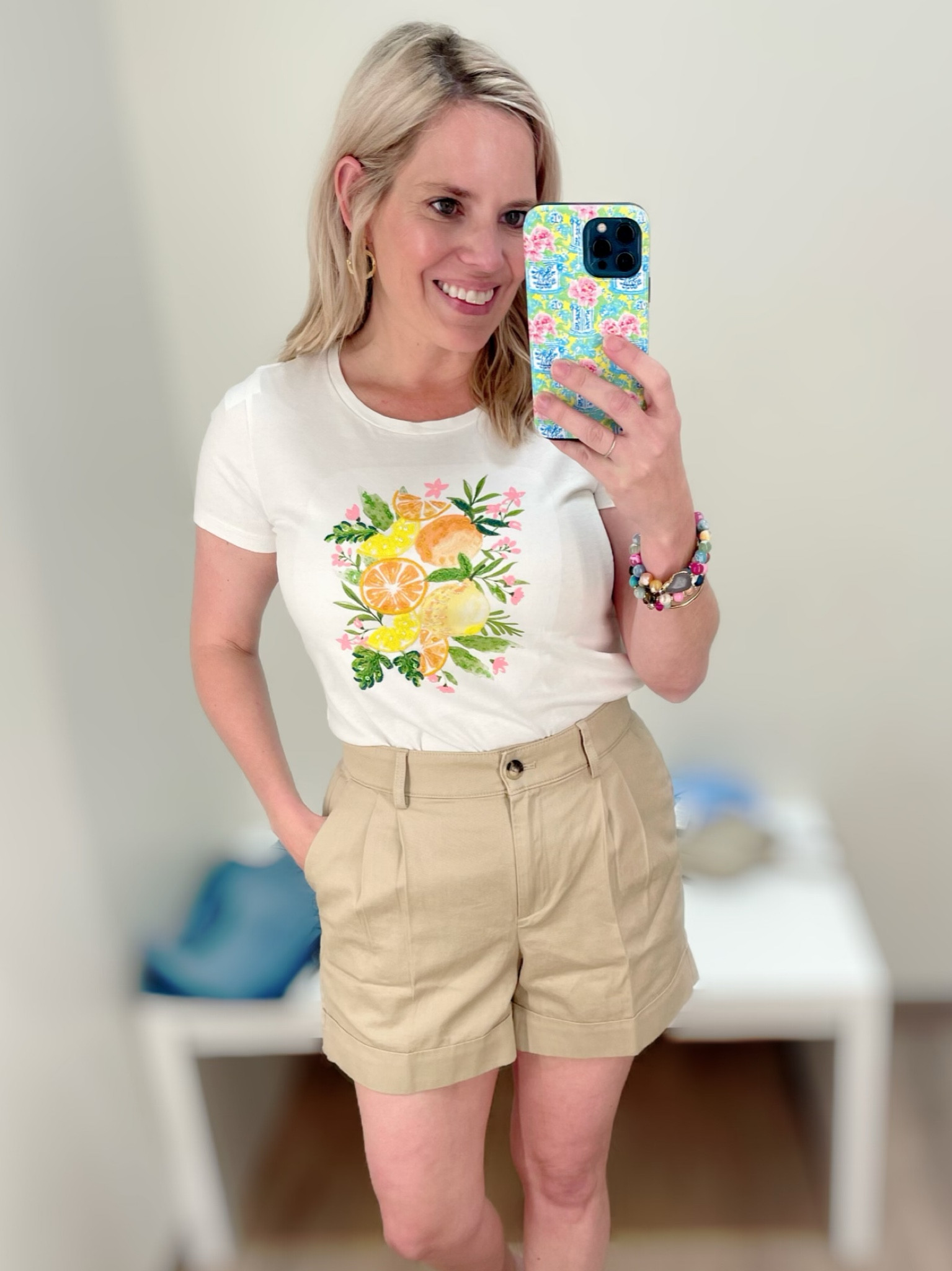 Size 4 pleated khaki shorts, size S lemon sequin tee 

#LTKOver40 #LTKFindsUnder50 #LTKFindsUnder100
