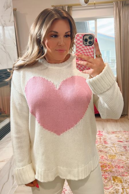 curvy valentine casual look! wearing size large in pink heart sweater {runs oversized} and 32 in cream straight leg denim! 

#LTKcurves #LTKunder100 #LTKSeasonal