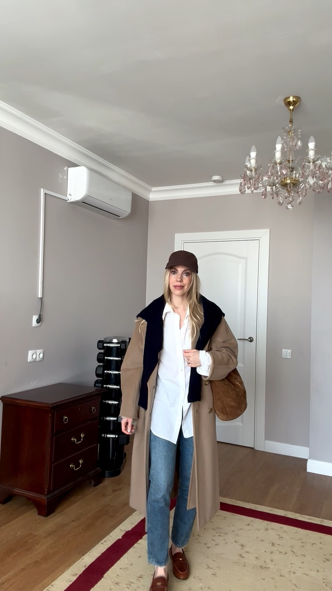 Travel style, CBK minimal style, camel coat, white button down, cigarette jeans, @Zara loafers, Saint Laurent suede bucket bag

#LTKootd #LTKTravel #LTKOver40