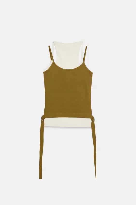 Top made from a cotton blend yarn. Featuring a round neckline, thin straps, a contrast fabric dou... | Zara UK