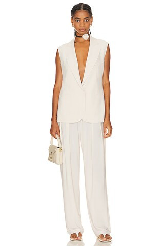 Tapered Pleated Trouser in Bone | Revolve Clothing (Global)