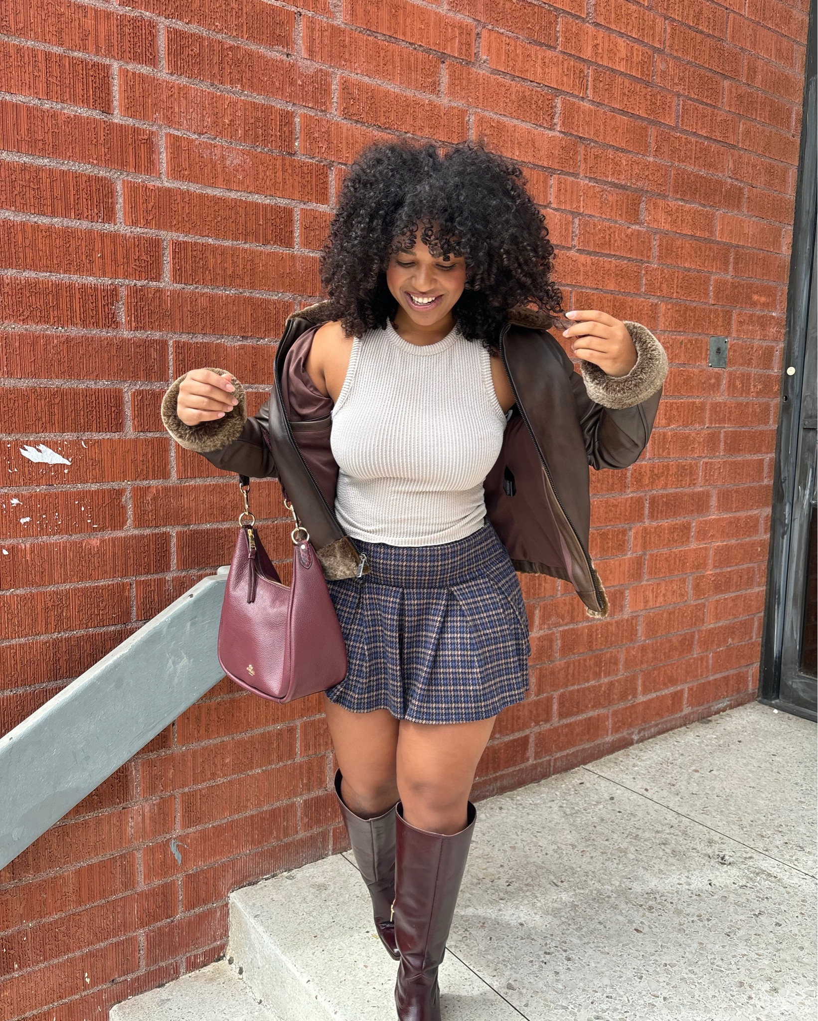 Fall is almost here!!! Loving this adorable skirt by American Eagle! I’m wearing a size small but you should size up if you want it to be a bit longer or if you have 🍑 (it’s long in the front for me but kinda short in the back!)

Jacket is Thursdays! 

plaid skirt
fall boots
wine colored boots
berry boots
coach bag
wine bag
fur coat 
ribbed basic top

#LTKSeasonal #LTKFallSale #LTKSaleAlert