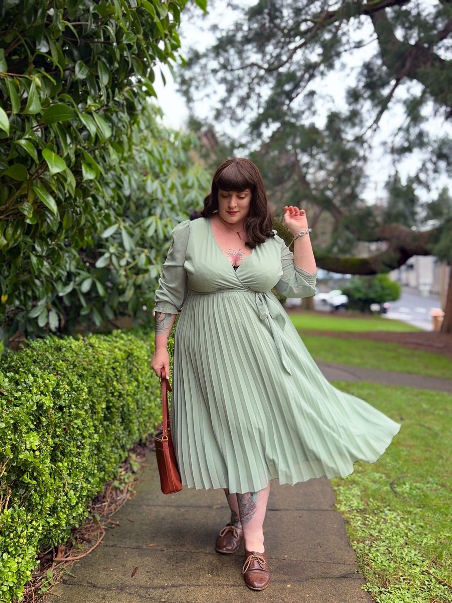 Pleated sage green dress with sleeves and faux wrap design

#LTKOver40 #LTKPlusSize #LTKSeasonal