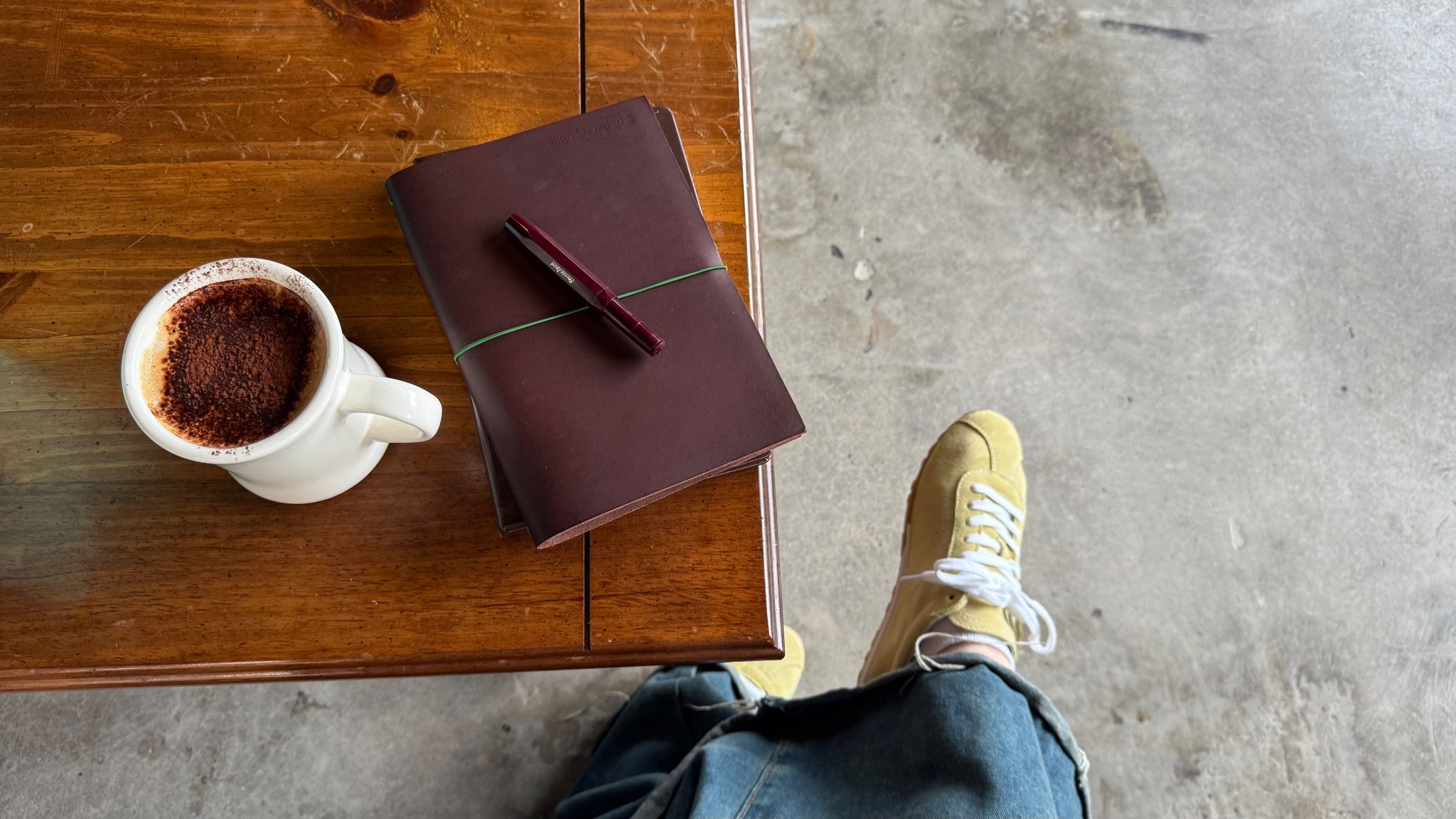 My perfect coffee shop set up includes my leather journal, fountain pen, fav pants & sneakers, and a big fat tiramisu latte <3