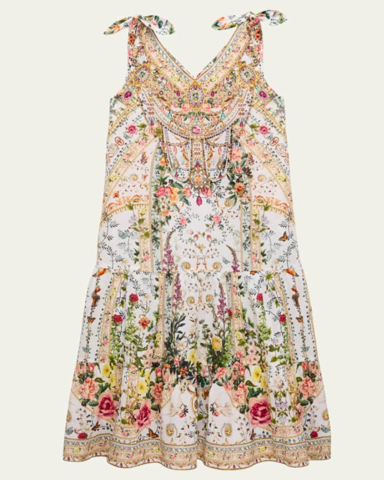 CAMILLA
Girl's Renaissance Romance Tiered Dress with Bows

Camilla tiered dress depicts a lavish garden of lattice,
florals and golden filigree
V neckline adorned with crystal embellishments
Attached shoulder bows
High-low skirt

#LTKKids #LTKParties #LTKStyleTip