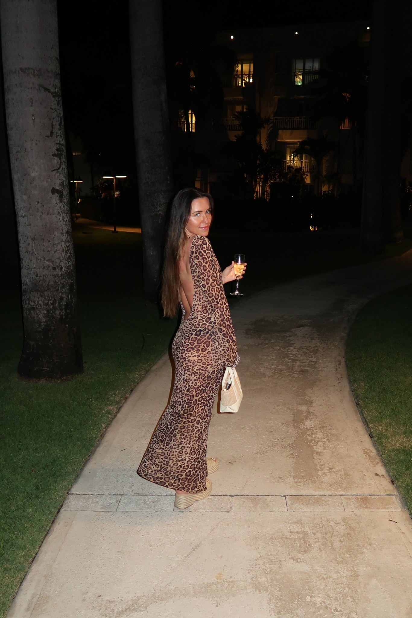 nighttime vacation outfit. this open back leopard dress is so fun for vacation and can also be used as a swimsuit coverup. I’m wearing a size small 