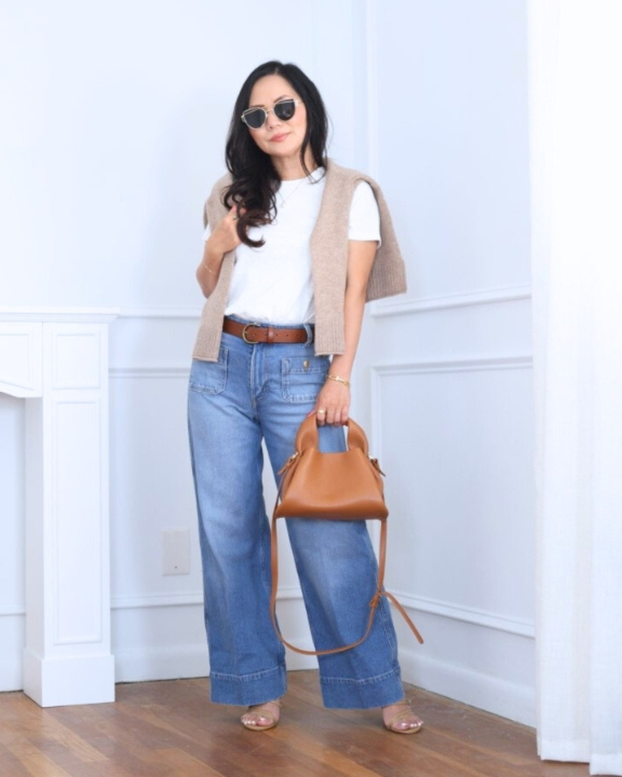 Layered a sweater over my shoulders for a relaxed touch, paired it with a tee and bag from Quince, and finished the look with classic jeans from H&M — casual but put-together. I’m 5’2, wearing size XS.

#LTKOver40 #LTKPetite #LTKStyleTip