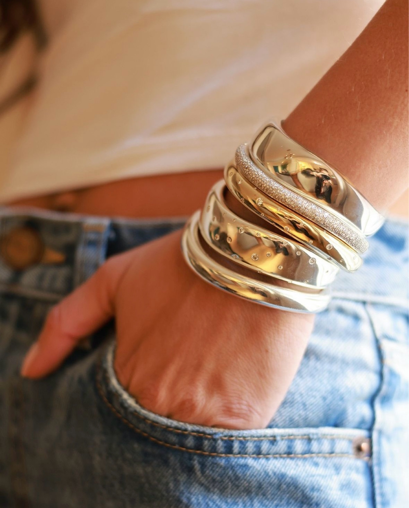 Such a chic bracelet stack! Cuffs are huge this season and a stack of these gives off a big cuff look but you can switch it up

Sterling silver
John Hardy jewelry
Diamond bracelet 
Gift guide
Holiday gifts
#saksteam #sakspartner

#LTKHoliday #LTKStyleTip #LTKGiftGuide