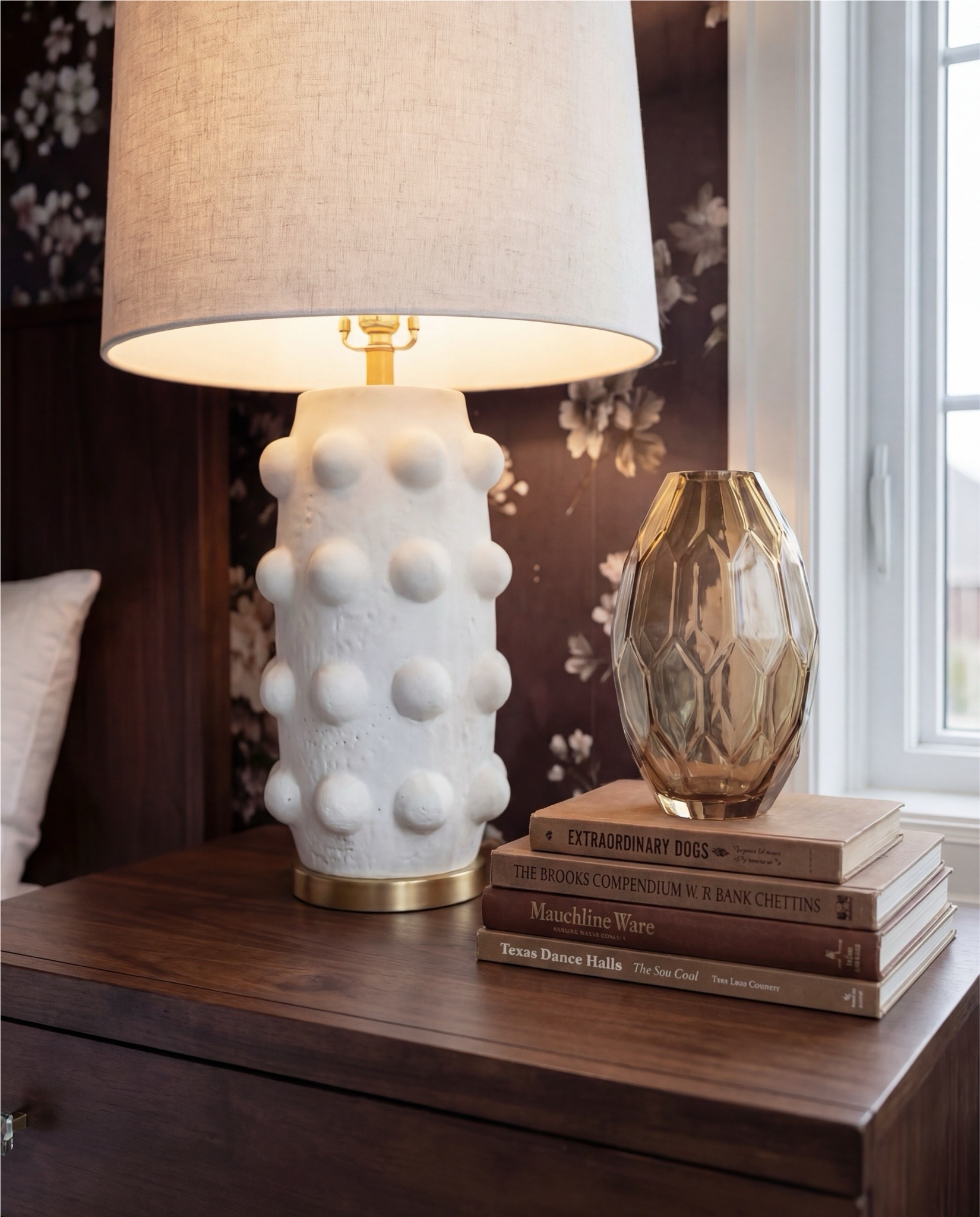 Shop the Look: Bedroom Refresh
Dark wood and brass bed
Sand and taupe throw pillows
Chunky cocoa brown knit throw
Caramel brown ribbed bench
Vintage-inspired terracotta and sage rug
Wood nightstands
Textured white lamps
Moody floral wallpaper
Globe pendant
Glass vase
Decor books

#LTKSaleAlert #LTKHome