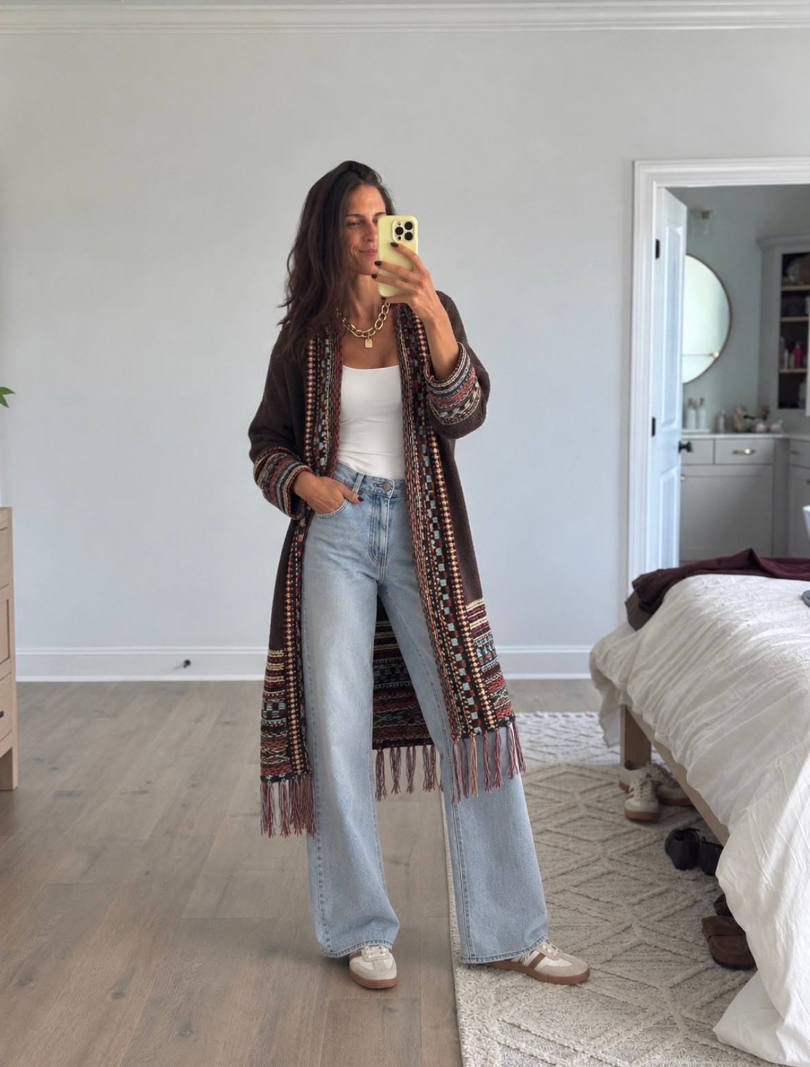 The cardigan of fall dreams 🤎🍂 Love the rich colors, cozy oversized fit, and fringe detail. So cute with wide-leg denim + sneakers for an easy everyday fall look! #falloutfit #fallstyle #casualstyle #LTKfinds

#LTKSeasonal #LTKmomlife #LTKootd
