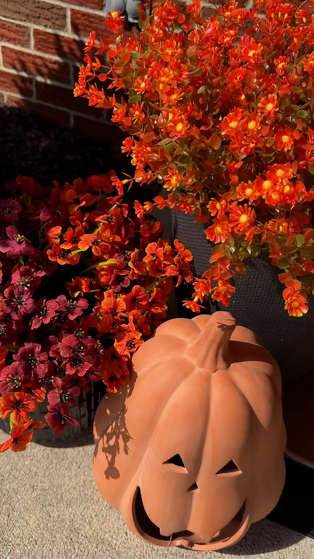 Fall porch refresh. 🍁 🎃 🤎 Faux mums and florals are the way to go!! 

Grey jack o lantern sold out 😔

#LTKSeasonal #LTKHome