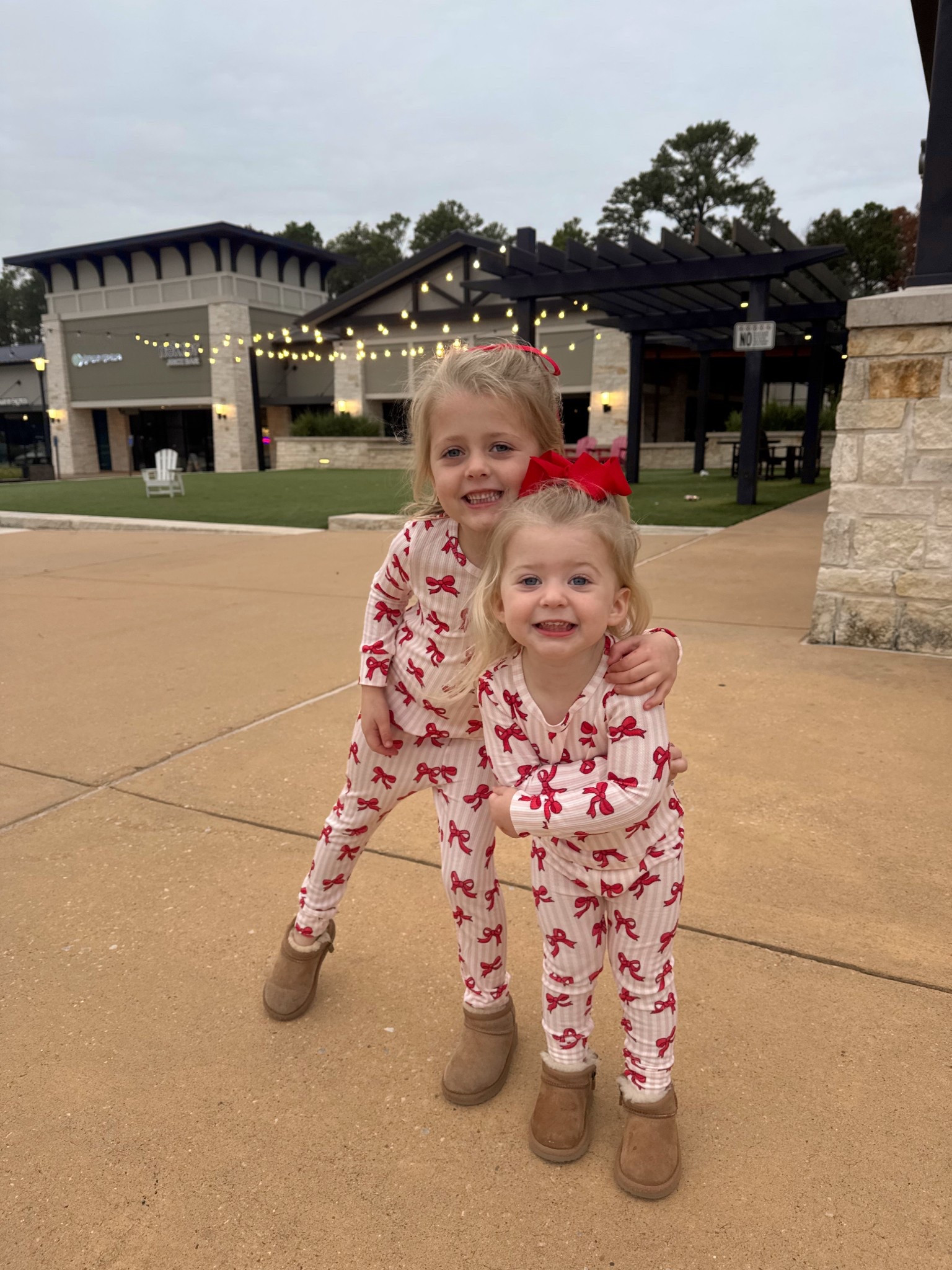 family date night seeing zootopia 2 🎥🍿🎞️ the girls christmas pjs are on sale for cyber monday!! 

toddler girls, sisters, matching, christmas
pajamas, caden lane, matching pajamas, holiday, gift guide, gifts for kids, uggs 

#LTKHoliday #LTKKids #LTKCyberWeek