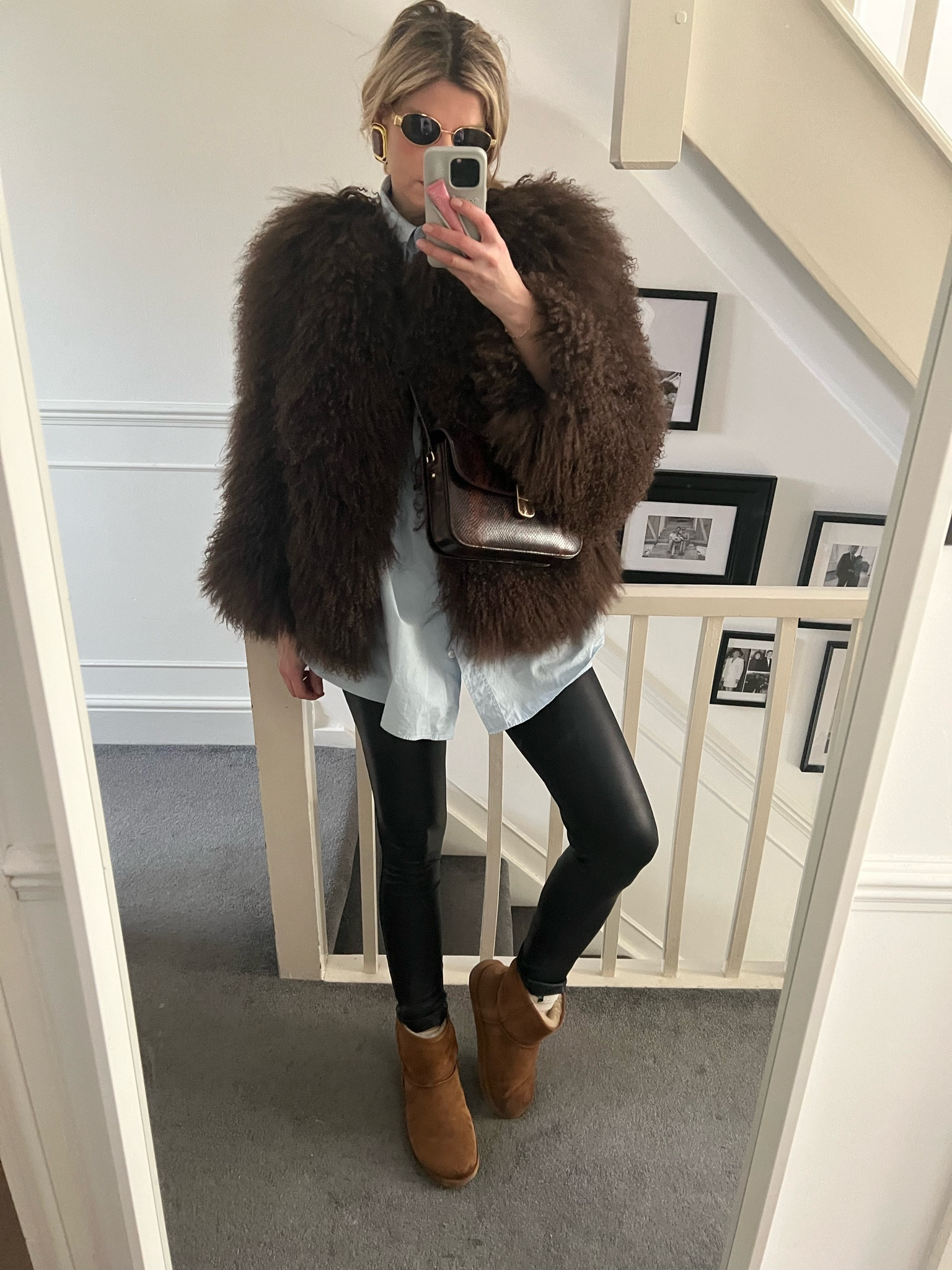 Warm winter outfit, Mongolian fur coat, Ugg boots, Milo bag, sezane bag, wet look leggings, snake print bag, mint velvet, celine sunglasses 

#LTKeurope #LTKstyletip #LTKwinter
