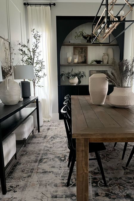 Dining room. I love the combination of natural wood and black! They work well together to bring a soft contrast and balance. My wood table is custom. The one I link here on ltk is a very close look alike. My black console table is discontinued, the one I link here is very similar. 
Modern organic home inspiration 

#LTKhome