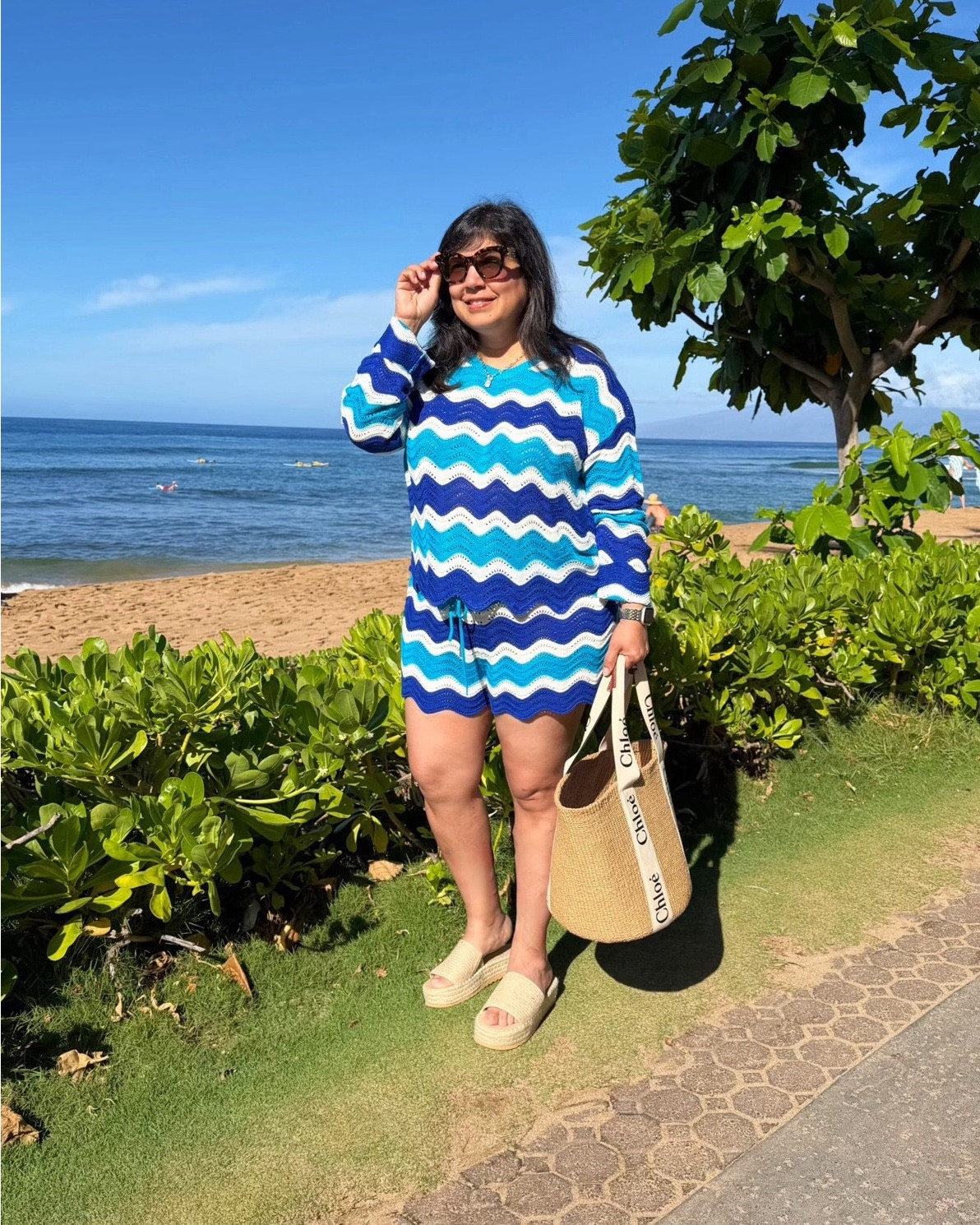 This matching set is the cutest vacation outfit for the beach! Perfect resort wear to go from the pool or beach to lunch. This color combo is no longer available but there are several pretty new ones that are really cute! 

Wearing XL in the top and bottom. BEACH raffia platform sandals. Chloe raffia tote bag. Miu Miu sunglasses. 

Vacation outfits beach, resort wear, what to wear in Hawaii, what to wear in Maui

#LTKTravel #LTKOver40 #LTKMidsize