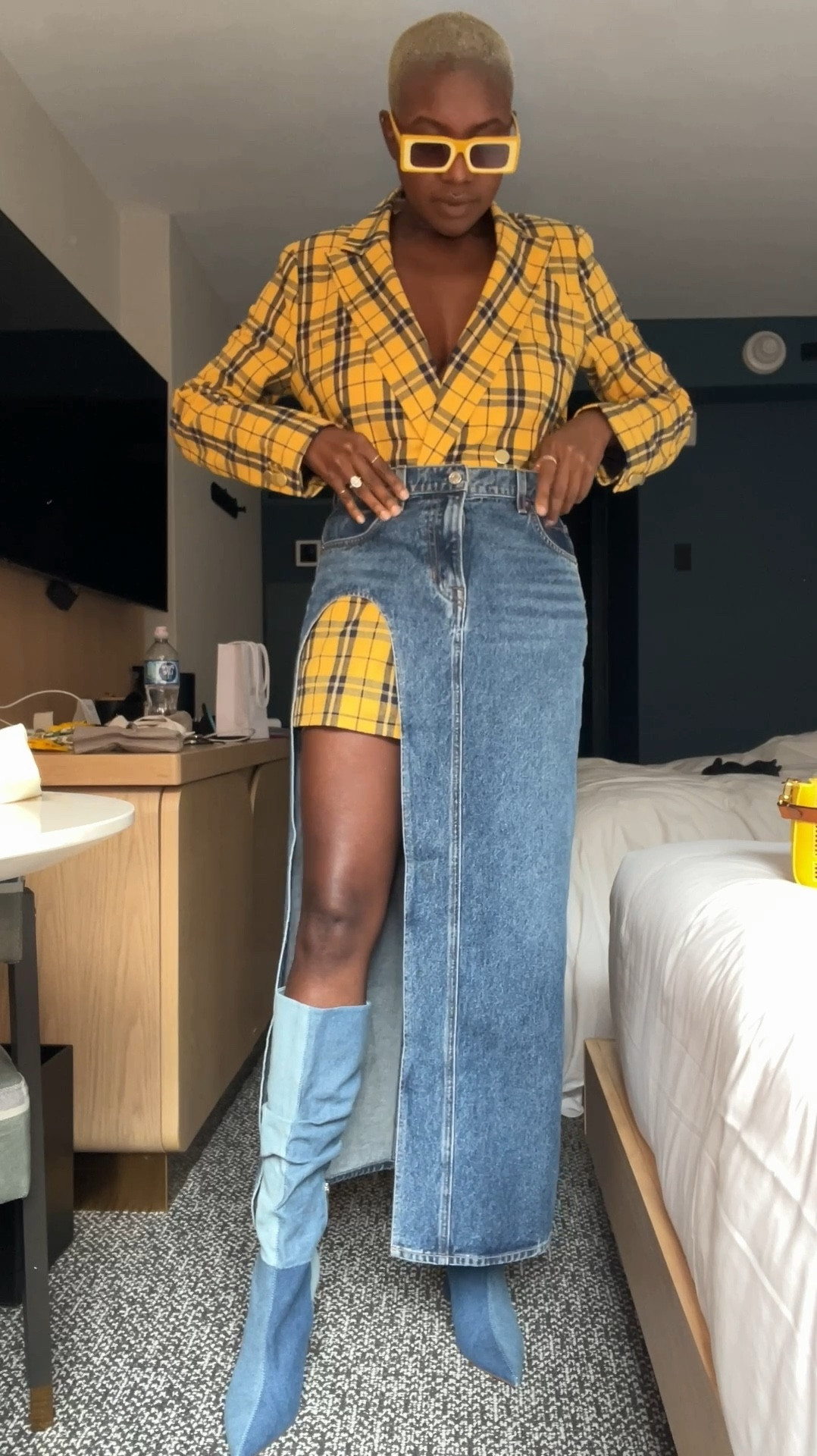Colorful fall out I wore for NYFW! Plaid yellow blazer, denim maxi skirt with high slit, denim boots and yellow embroidered Fendi Baguette purse  

#LTKVideo #LTKItBag