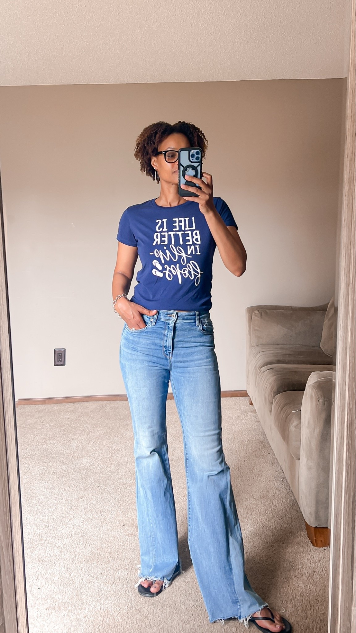 Life is better in flip flops! Just a nice chill graphic tee from @Kohl's and some flare leg jeans

#LTKootd #LTKOver40 #LTKTall