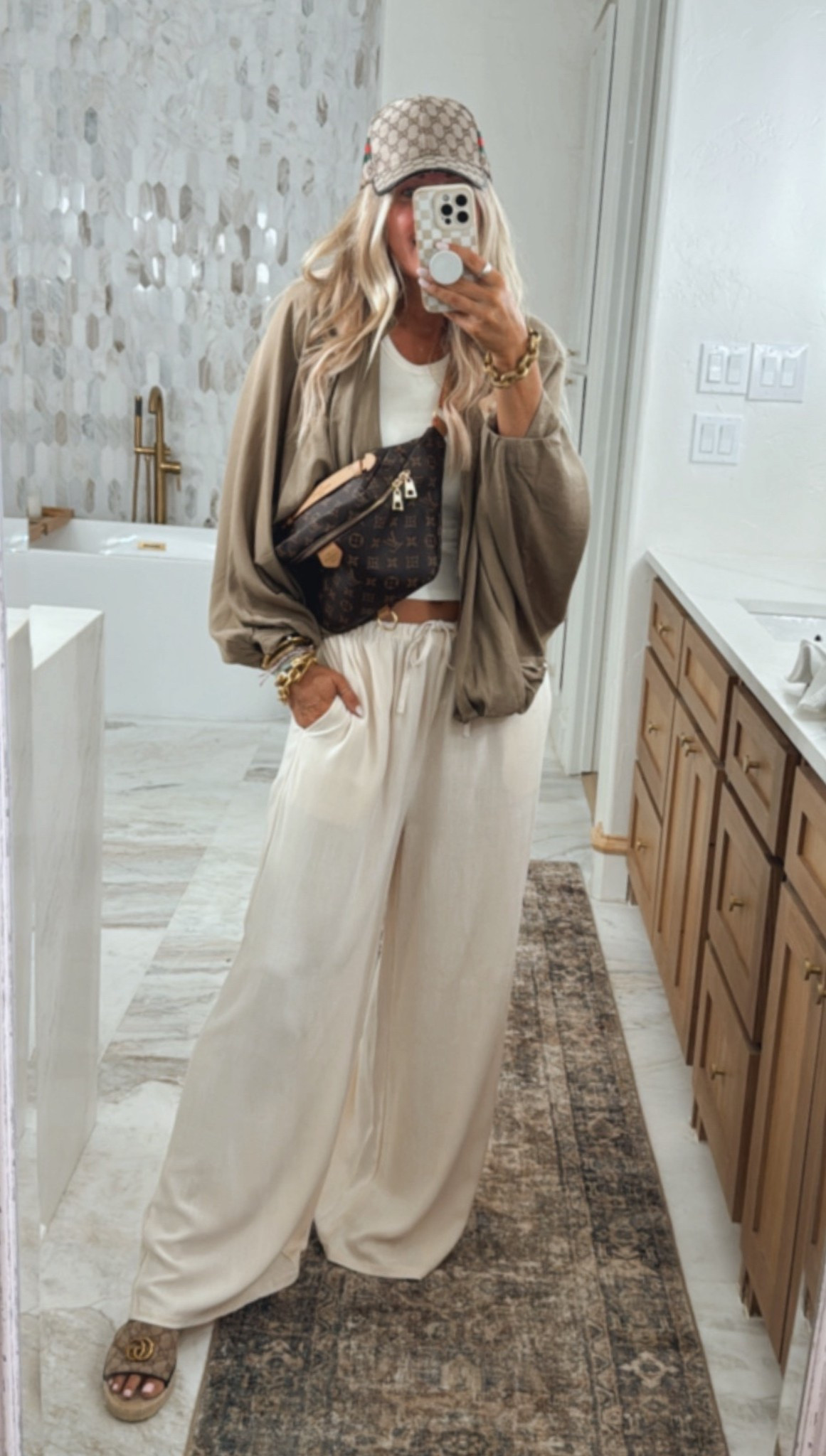 Travel outfit. Ring. Jewelry. Hallway. Rug. Primary bedroom. Foyer. Table. Home decor. Bathroom. Primary bathroom. Mirror. Lighting, Mesh ballet flats. Back to school. Teach outfits. East coast summer. Workwear 
. Whimsical dresses. Travel outfit. Pickleball . On cloud shoe. Sneakers. Fall shoes. NSale. Nordstom anniversary sale. . Girls trip. Summer sets. 2 piece set. Summer fashion. Pickleball outfit. Save vs splurge. Prime day deals. Socks. Amazon. Wedding guest dress. Beach wedding. . Hanes tank tops. Summer dress. Workwear. Teacher. Back to school  Prime day. Sale. Prime day deals. Country concert outfit. Sandals. Linen pants. Lake must have. Boat trip. The best radio I’ve traveled on several trips with and is waterproof. . Swimsuit fits true to size. Free people looks for less set fits true to size, wearing medium. Travel outfit. Girls trip. 
Vacation outfits. Butter yellow. Date night outfit. Linen pants sized up to large. Date night. American flag sweater. Costa Rica.  Fall fashion. NSale. Nordstrom anniversary sale. Vacation outfit. Butter yellow. Outfit fits true to size, but I Sized up to large in tee and boxer shorts for this oversized fit. Swimsuit. Bikini. Coverup. Linen pants. Sized up to a large in the top and sweatpants for this fit. Summer outfits. Sandals. . Swimsuit. Travel outfit. Resort wear. Maxi dress. Spring wedding guest dress. Wedding guest dress 2025. Graduation outfit. Workwear. Cardigan. Maxi dress. Resort wear. Date night. Spring 2025. Activewear all fits true to size. The loose free people looks for less top sized up 2 sizes to XL for that very oversized fit. Butter yellow. Weighted vest. Workout outfit. Sports bras fit tts. Nike shoes perfect to workout. A few spring favorites and things I don’t regret buying. Spring fashion. Daily deal. Beauty. Travel. Adidas sambas. Adidas. 


Comment SHOP below to receive a DM with the link to this post on my LTK ⬇ https://liketk.it/5jX6N #ltkover40 #ltksalealert #ltktravel

#LTKTravel #LTKWorkwear