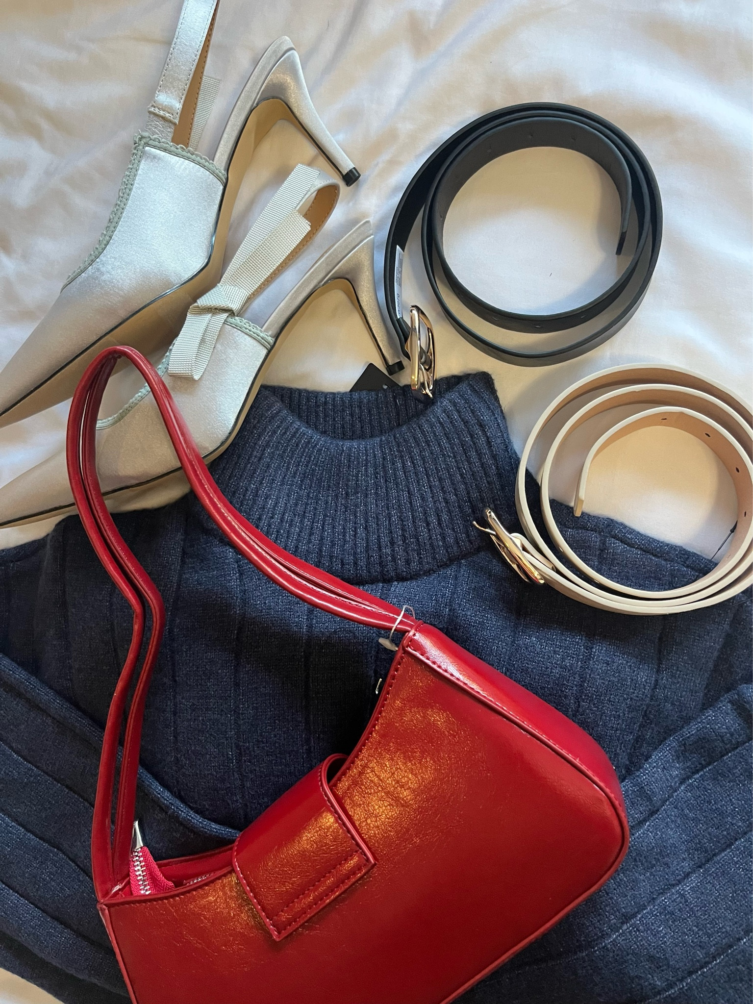 Lulus winter haul 🤸🏽‍♀️ A cute sweater, kitten heels, a red purse and belts! 

#LTKFindsUnder50 #LTKWorkwear #LTKSaleAlert