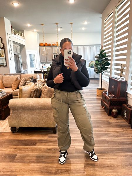Top- medium 
Cargo pants - tts -  29 
Vest- medium 
Sneakers- tts 

Winter outfit - winter style - cargo pants - everyday outfit - edgy outfit - puffer vest - casual outfit - casual style - Nike dunks - Nike sneakers - sneakers - winter - spring outfit 

Follow my shop @styledbylynnai on the @shop.LTK app to shop this post and get my exclusive app-only content!

#liketkit 
@shop.ltk
https://liketk.it/4t0GI

Follow my shop @styledbylynnai on the @shop.LTK app to shop this post and get my exclusive app-only content!

#liketkit 
@shop.ltk
https://liketk.it/4uXR7

Follow my shop @styledbylynnai on the @shop.LTK app to shop this post and get my exclusive app-only content!

#liketkit 
@shop.ltk
https://liketk.it/4w7jr

Follow my shop @styledbylynnai on the @shop.LTK app to shop this post and get my exclusive app-only content!

#liketkit 
@shop.ltk
https://liketk.it/4wd60

Follow my shop @styledbylynnai on the @shop.LTK app to shop this post and get my exclusive app-only content!

#liketkit 
@shop.ltk
https://liketk.it/4wgXr

Follow my shop @styledbylynnai on the @shop.LTK app to shop this post and get my exclusive app-only content!

#liketkit 
@shop.ltk
https://liketk.it/4yy1W

Follow my shop @styledbylynnai on the @shop.LTK app to shop this post and get my exclusive app-only content!

#liketkit 
@shop.ltk
https://liketk.it/4yy27

Follow my shop @styledbylynnai on the @shop.LTK app to shop this post and get my exclusive app-only content!

#liketkit #LTKstyletip #LTKsalealert #LTKshoecrush
@shop.ltk
https://liketk.it/4yYvV