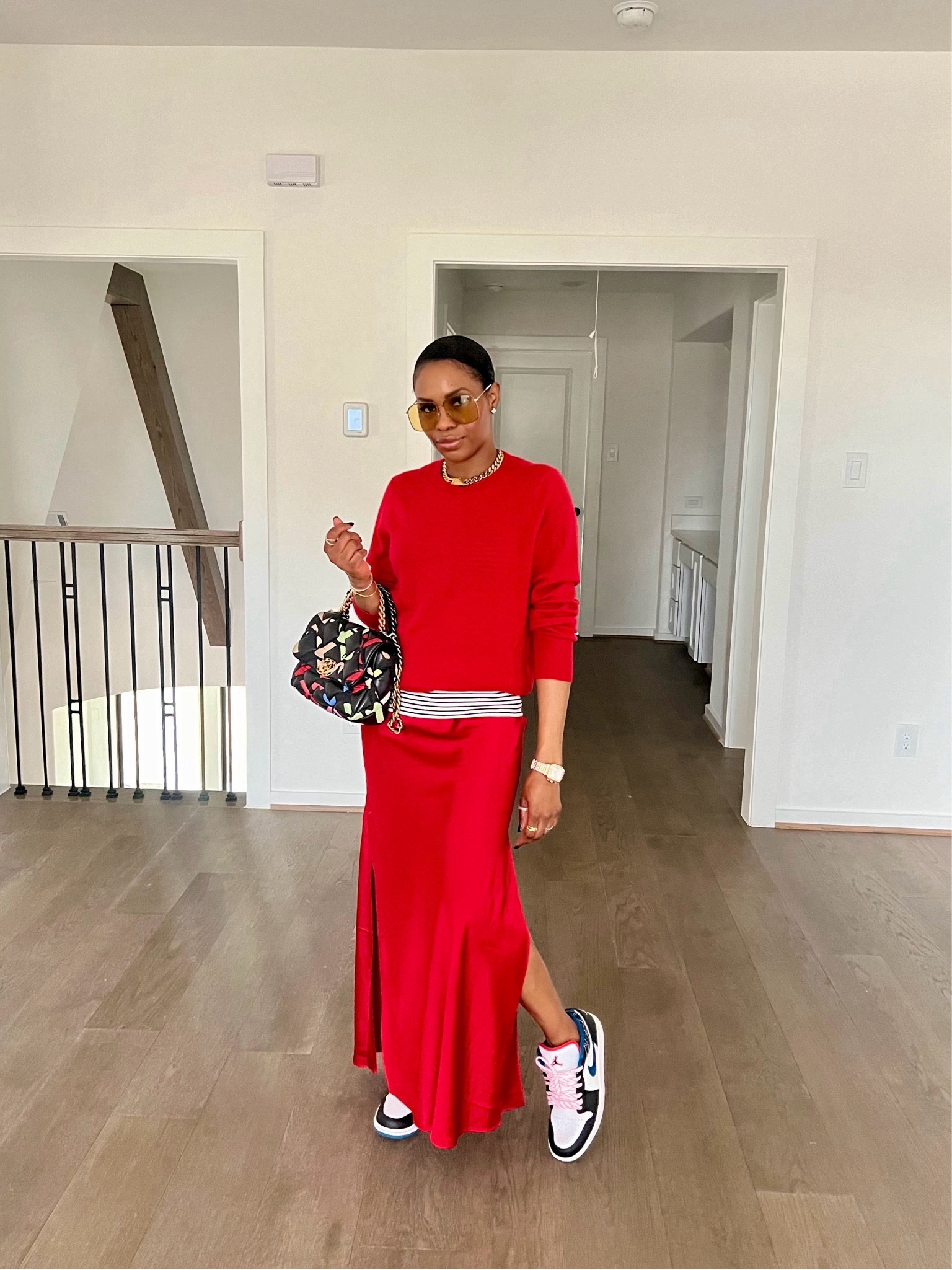 This red on red fit with black and white stripes is everything! Both my sweater and skirt are the perfect shade of red! 

#LTKstyletip #LTKover40 #LTKfindsunder100